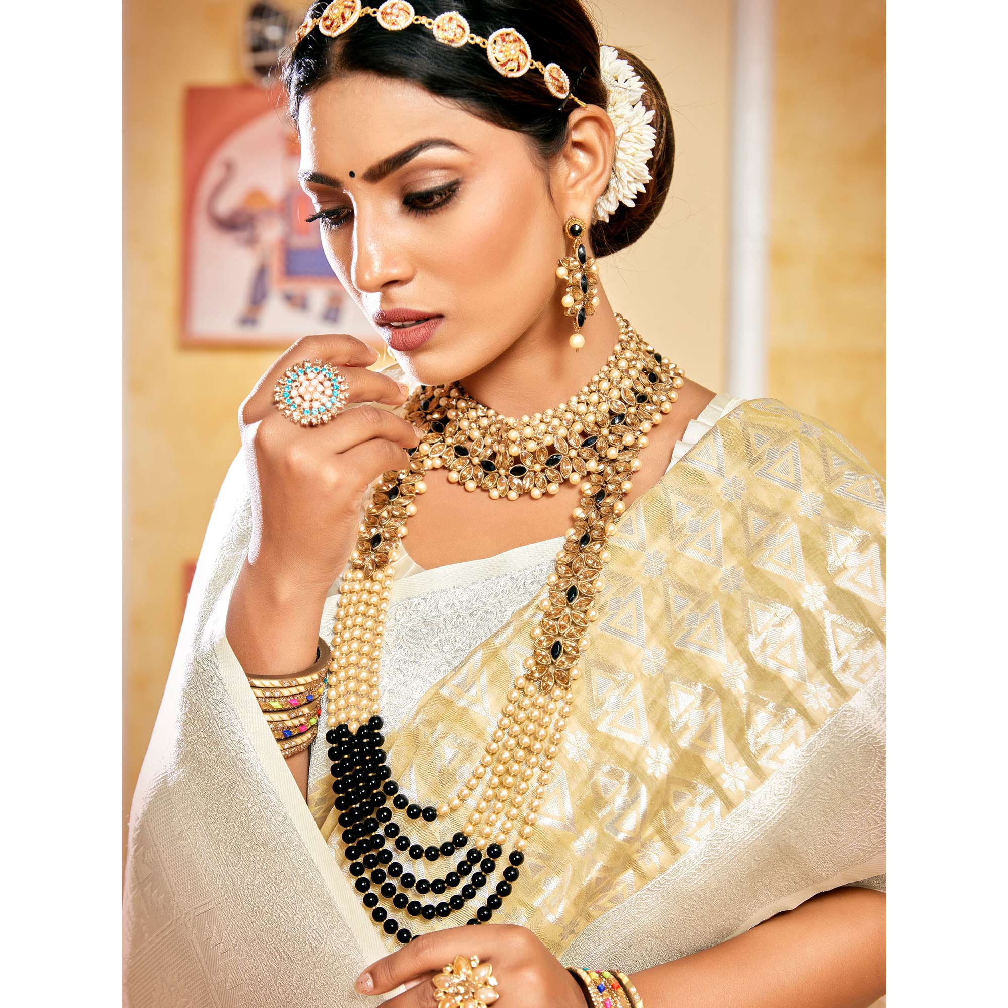 Beige Woven Cotton Silk Saree With Tassels