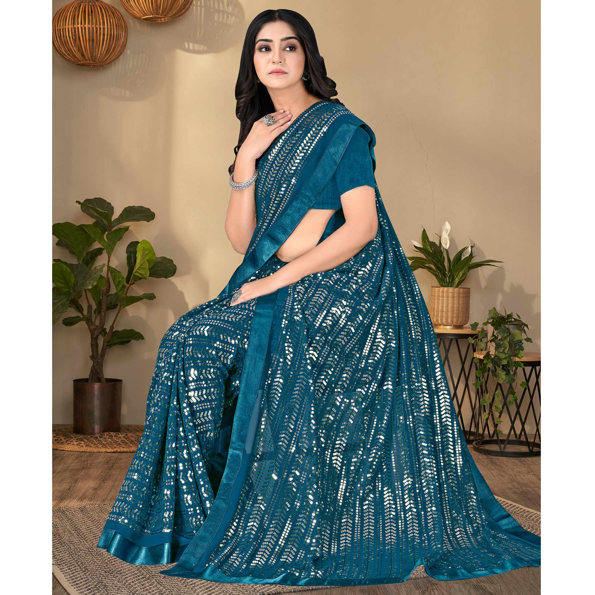 Teal Blue Sequins Embroidered Georgette Saree