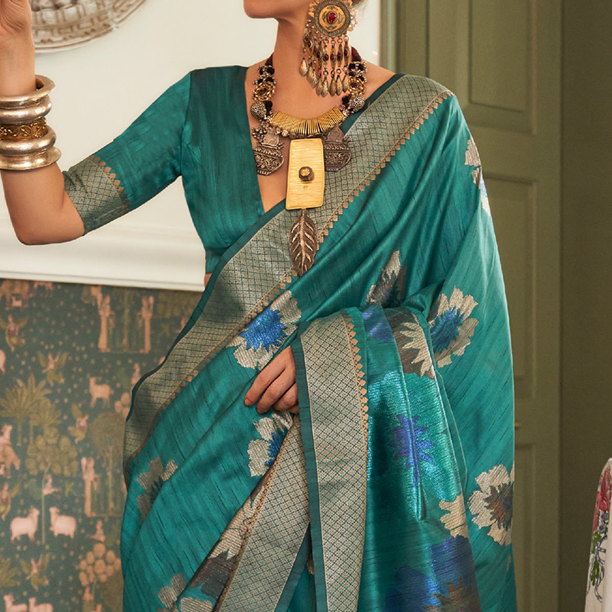 Turquoise Woven Art Silk Saree With Tassels