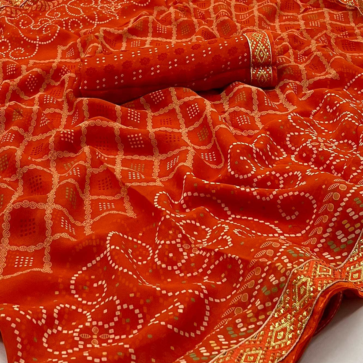 Orange Bandhani Printed Georgette Saree With Designer Border