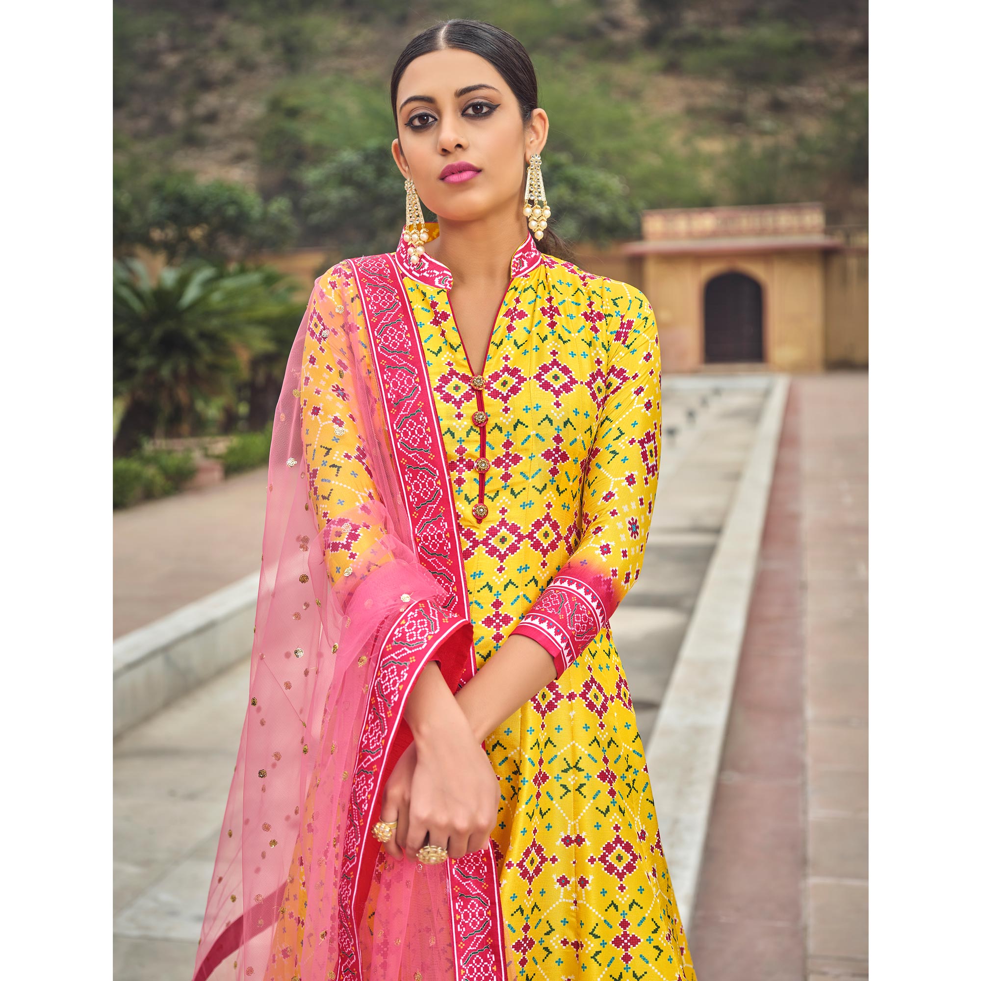 Yellow Patola Digital Printed Dola Silk Gown