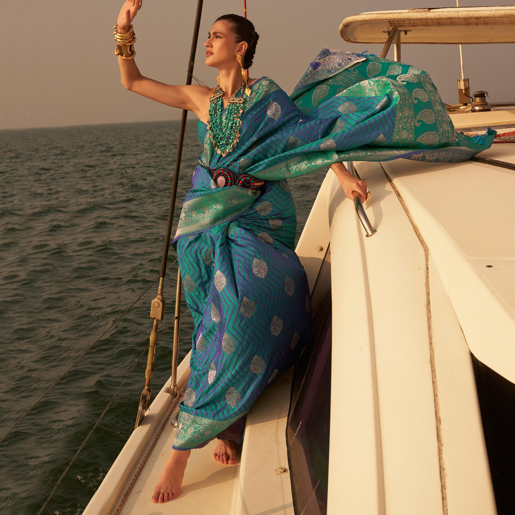 Blue & Green Woven Satin Saree With Tassels