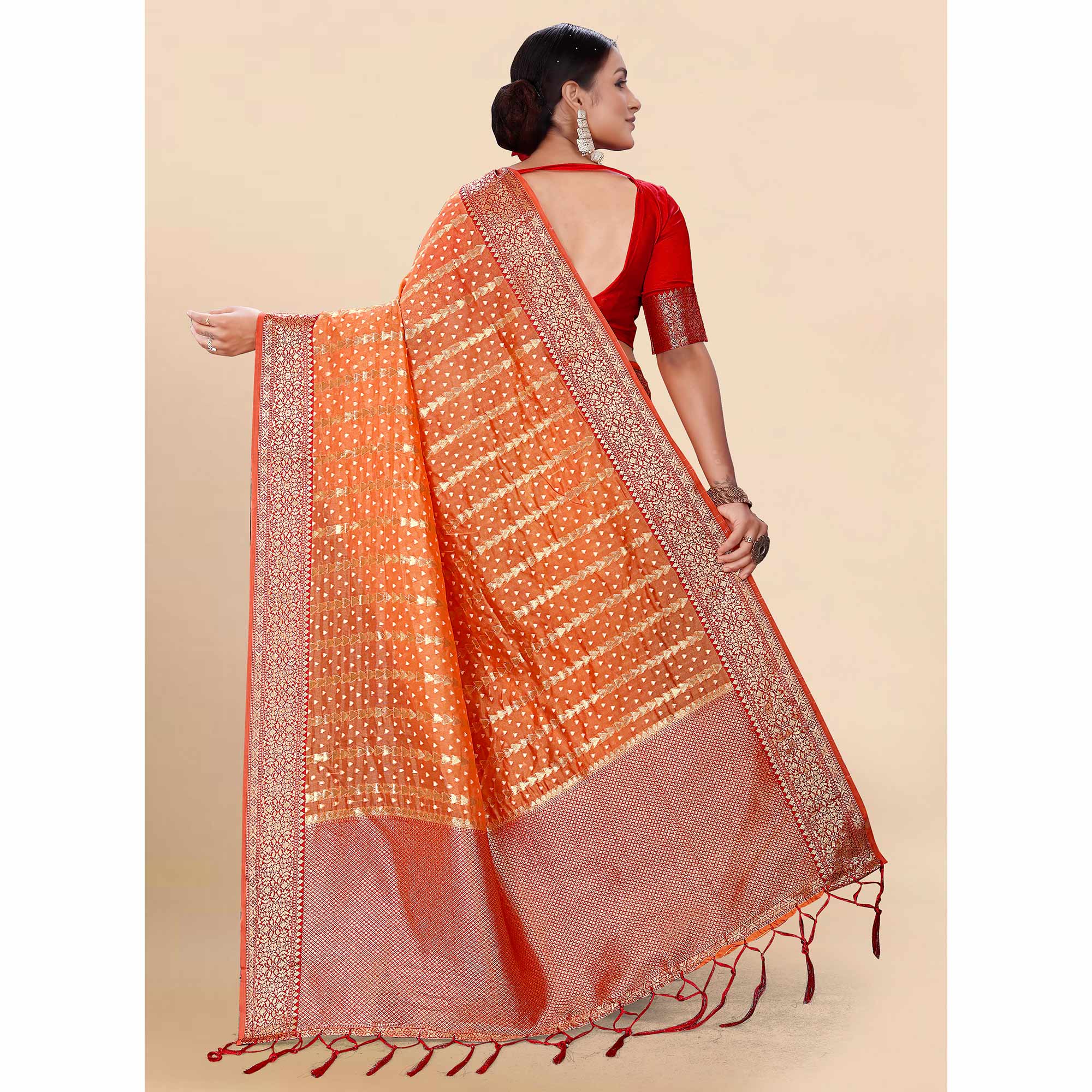 Orange Woven Organza Saree With Tassels