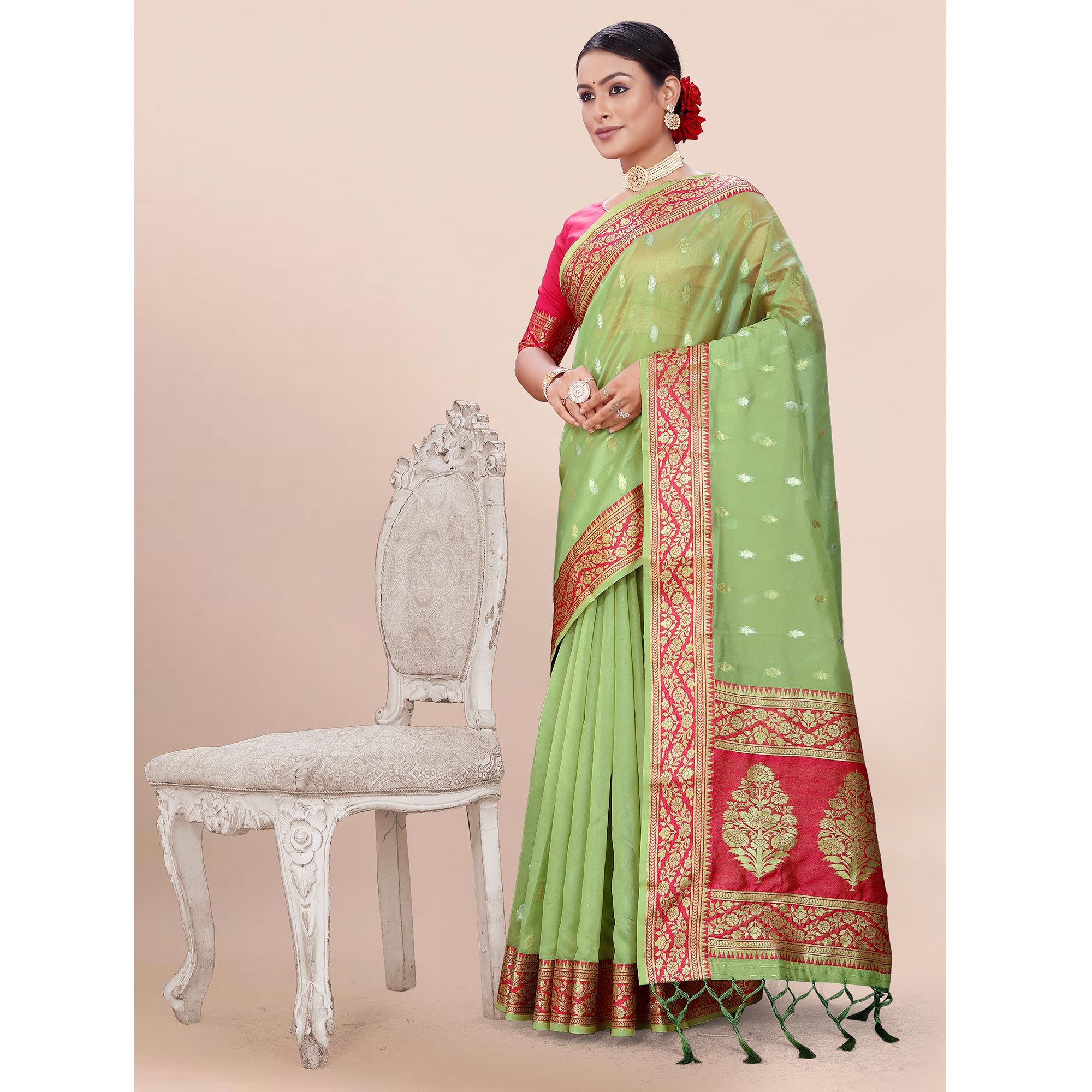 Pista Green Woven Organza Saree With Tassels