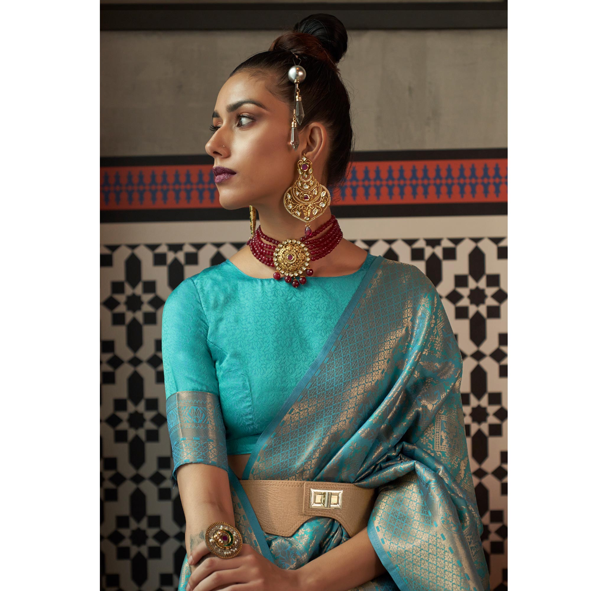 Turquoise Woven Art Silk Saree With Tassels