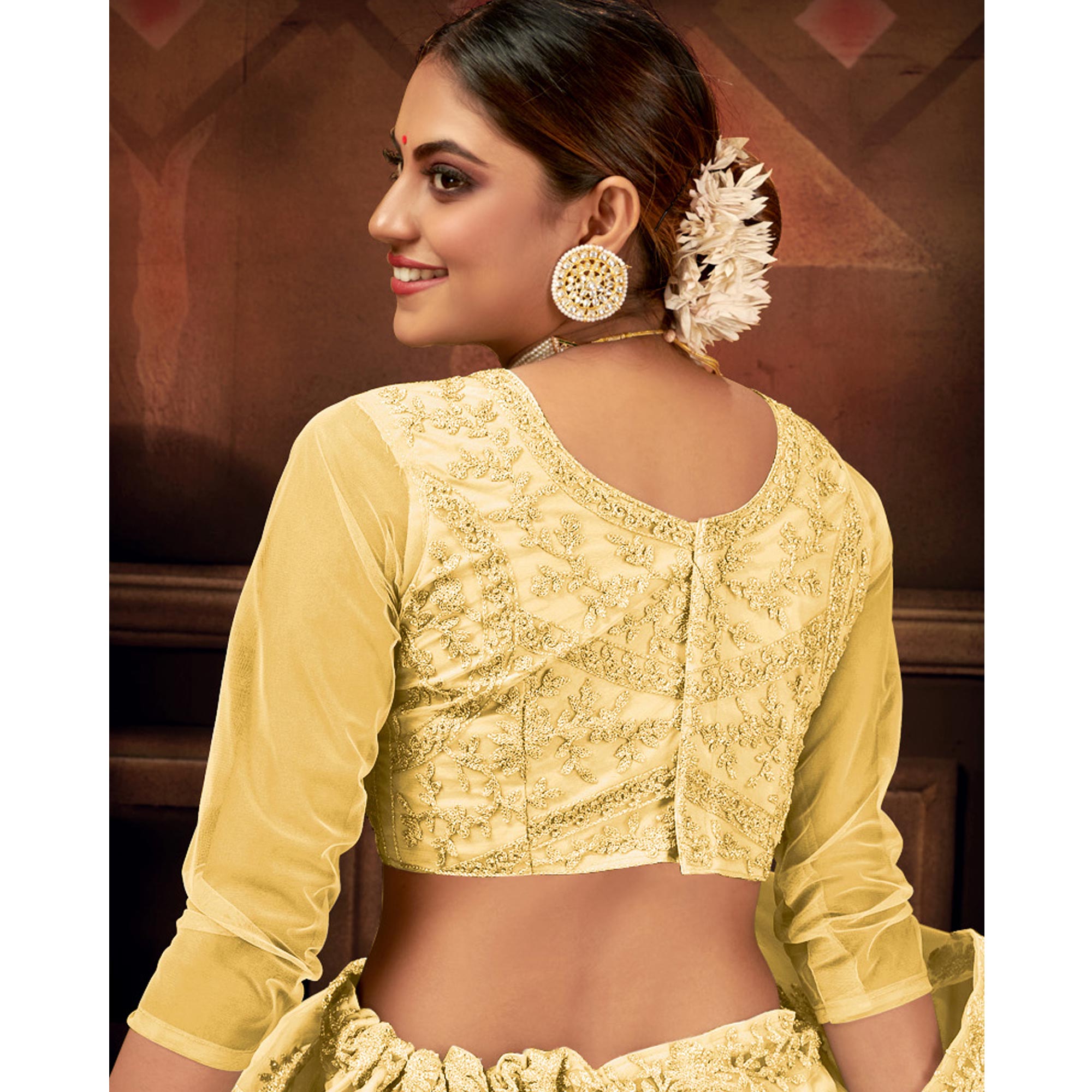 Yellow Embroidered Netted Lehenga Choli