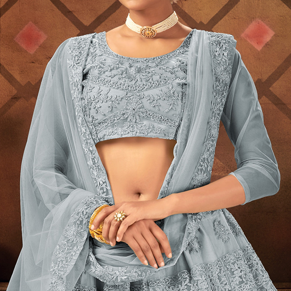 Grey Embroidered Netted Lehenga Choli