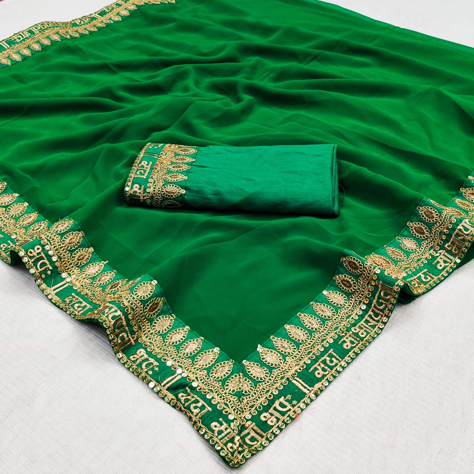 Green Embroidered Border Georgette Saree