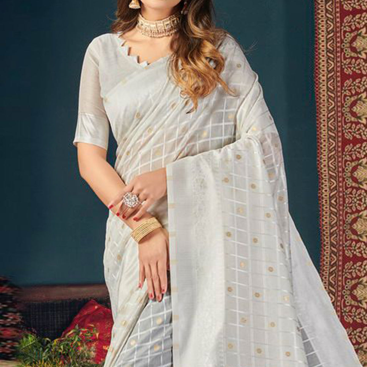 White Woven Cotton Blend Saree With Tassels