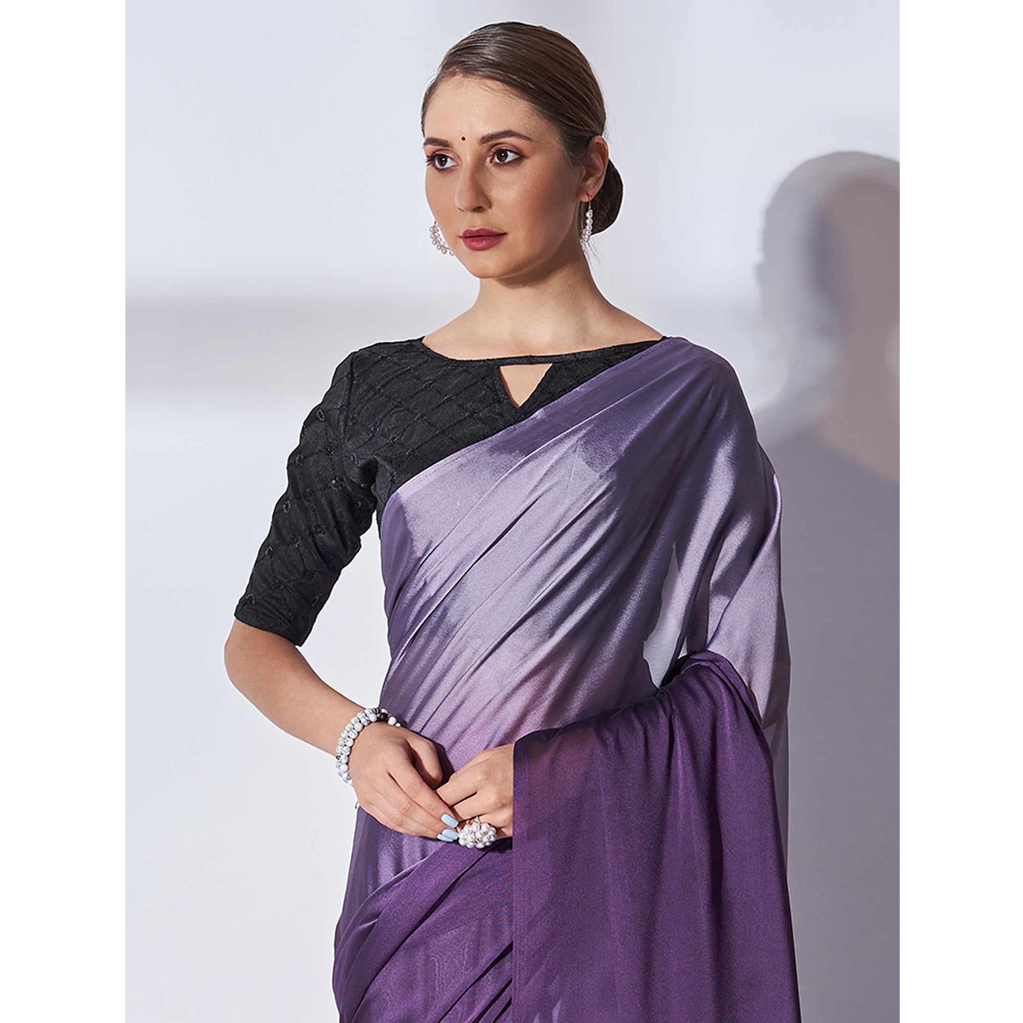 Purple Solid Georgette Saree With Tassels