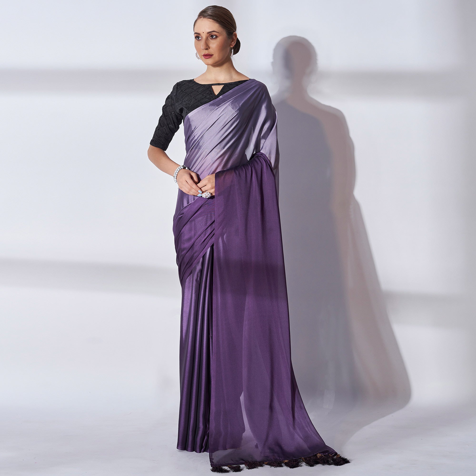 Purple Solid Georgette Saree With Tassels