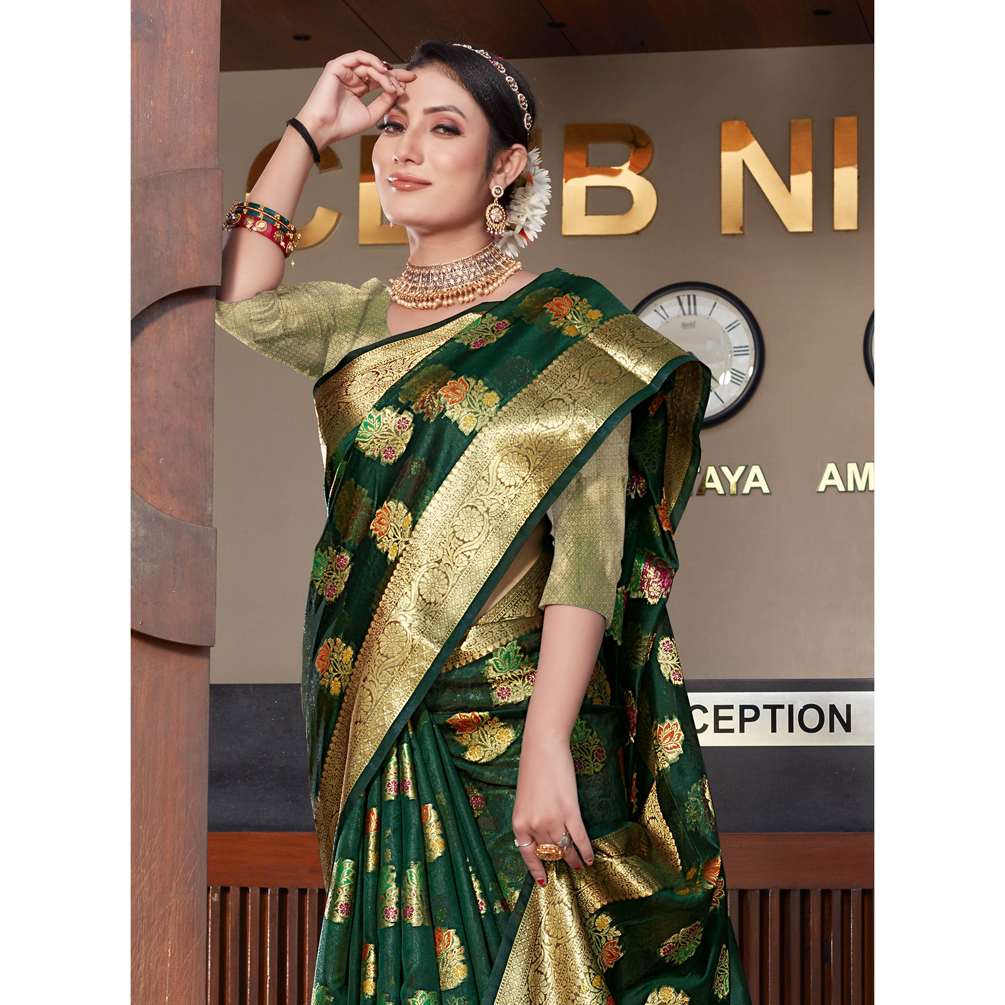 Bottle Green Floral Woven Organza Saree