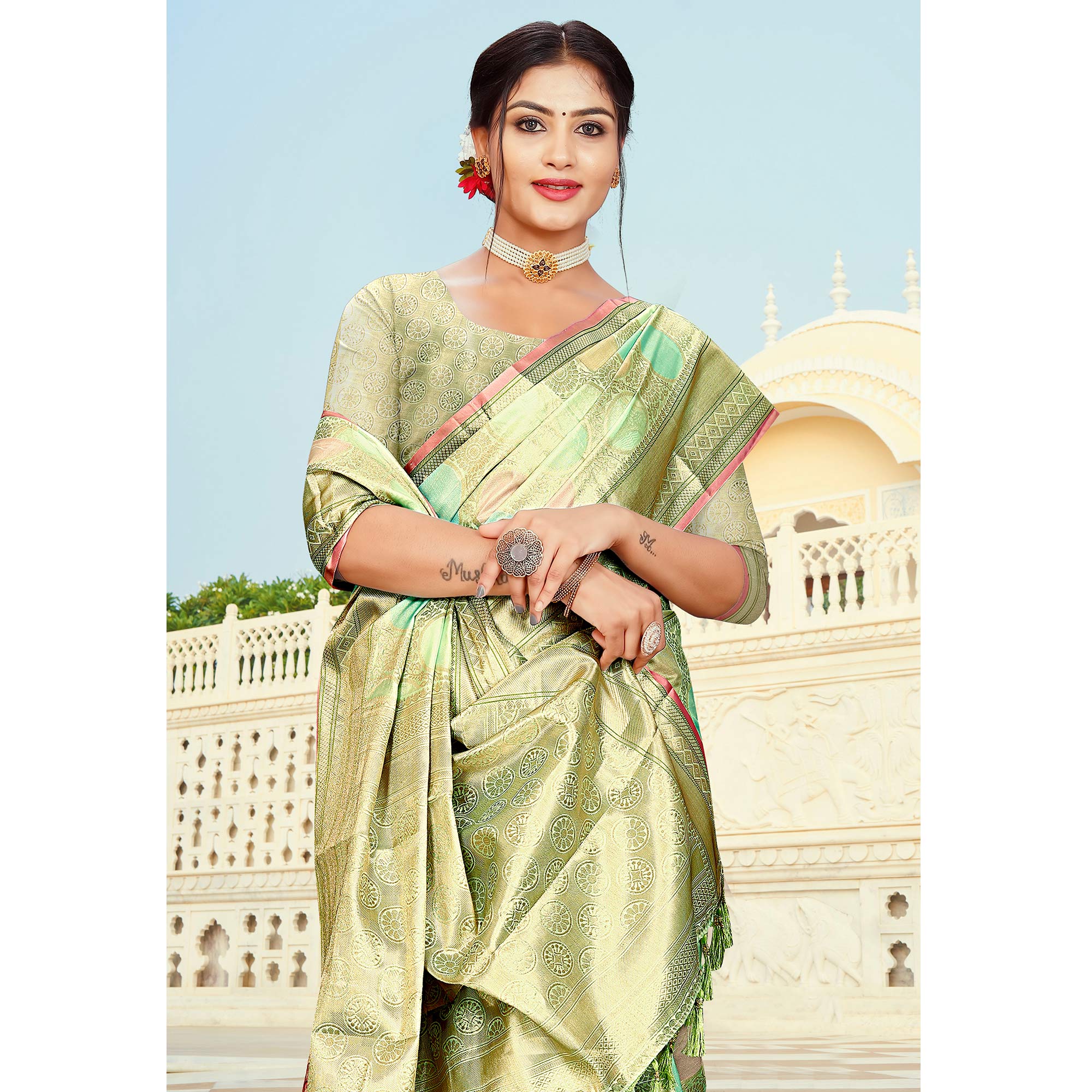 Pista Green Floral Woven Organza Saree With Tassels