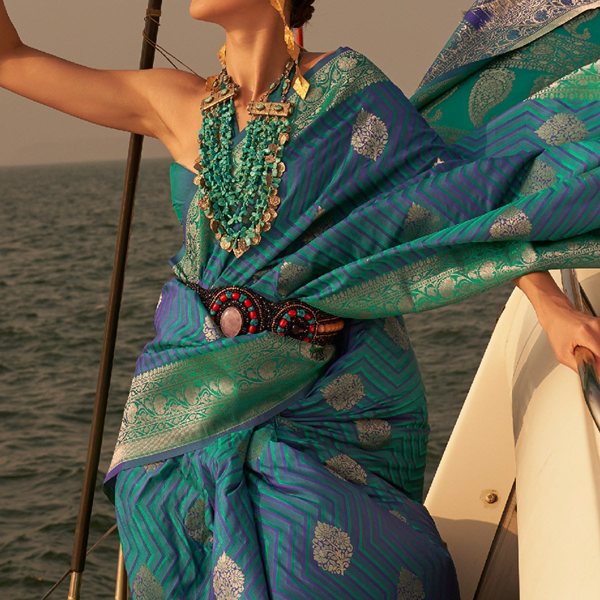 Blue & Green Woven Satin Saree With Tassels