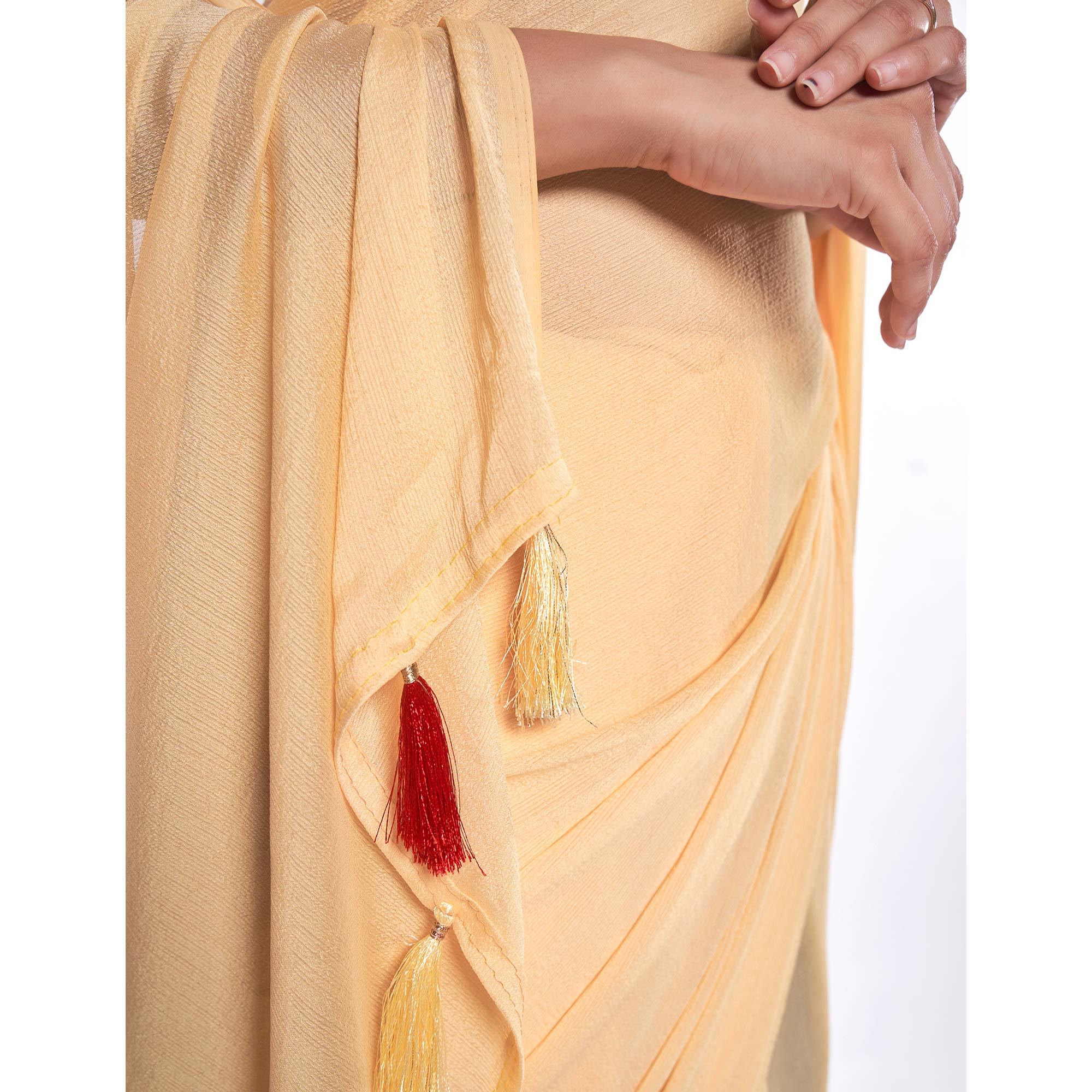 Yellow Solid Georgette Saree With Tassels