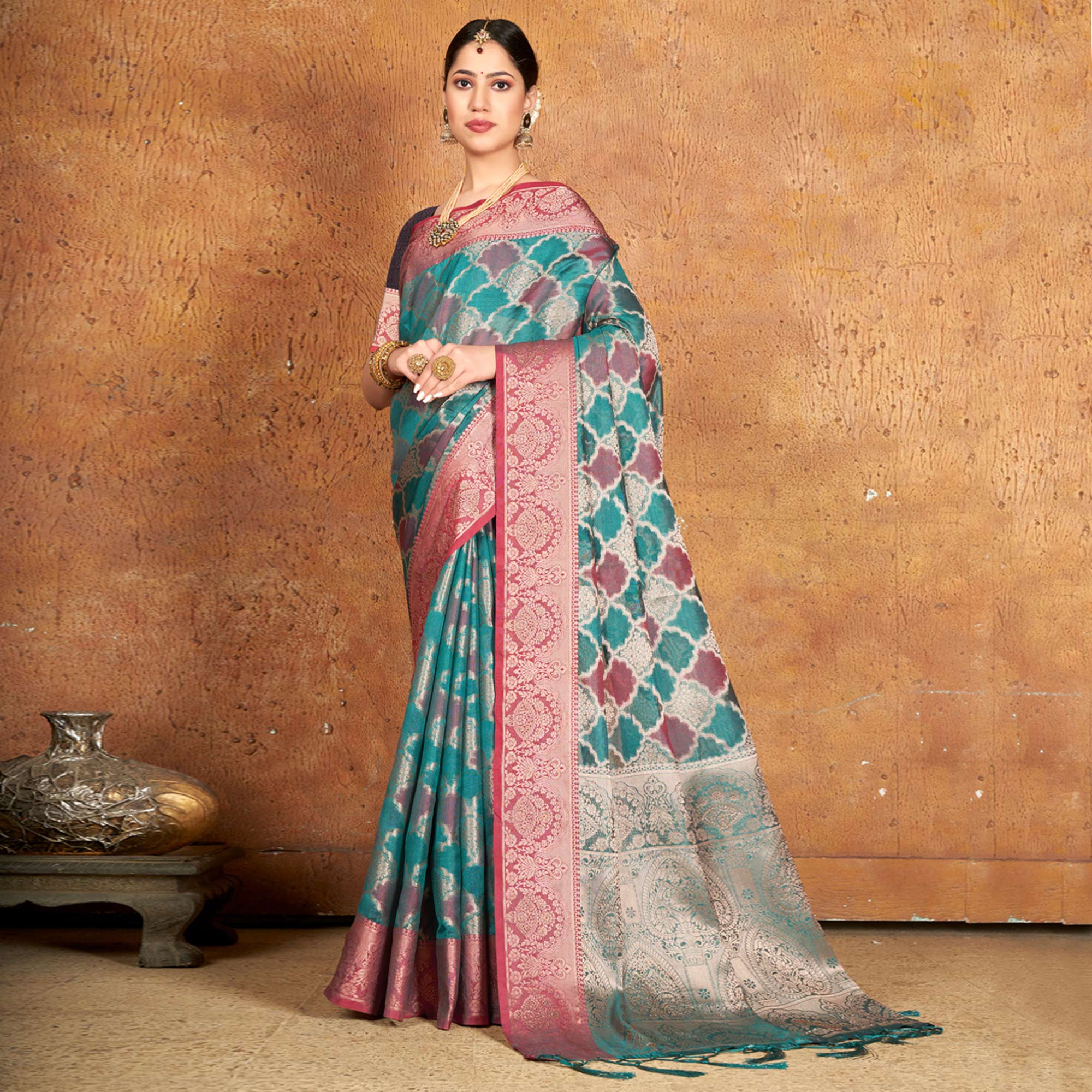 Turquoise Woven Organza Saree With Tassels