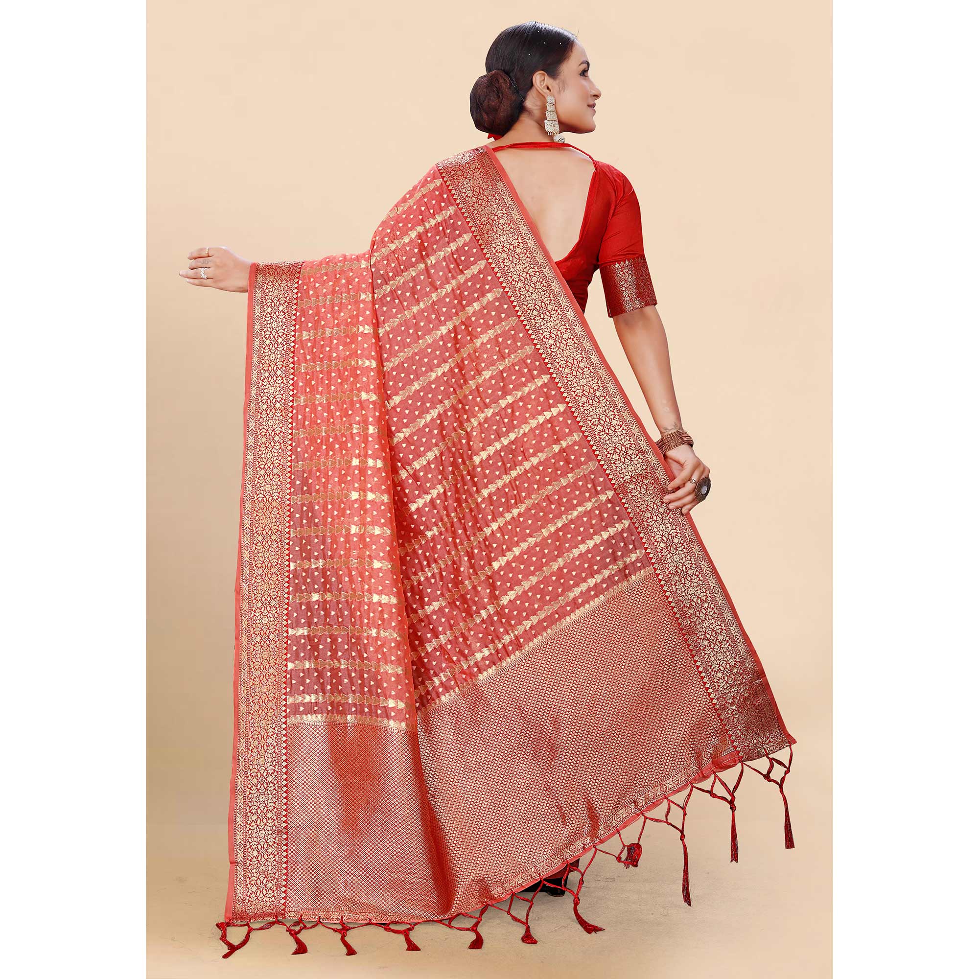 Pink Woven Organza Saree With Tassels