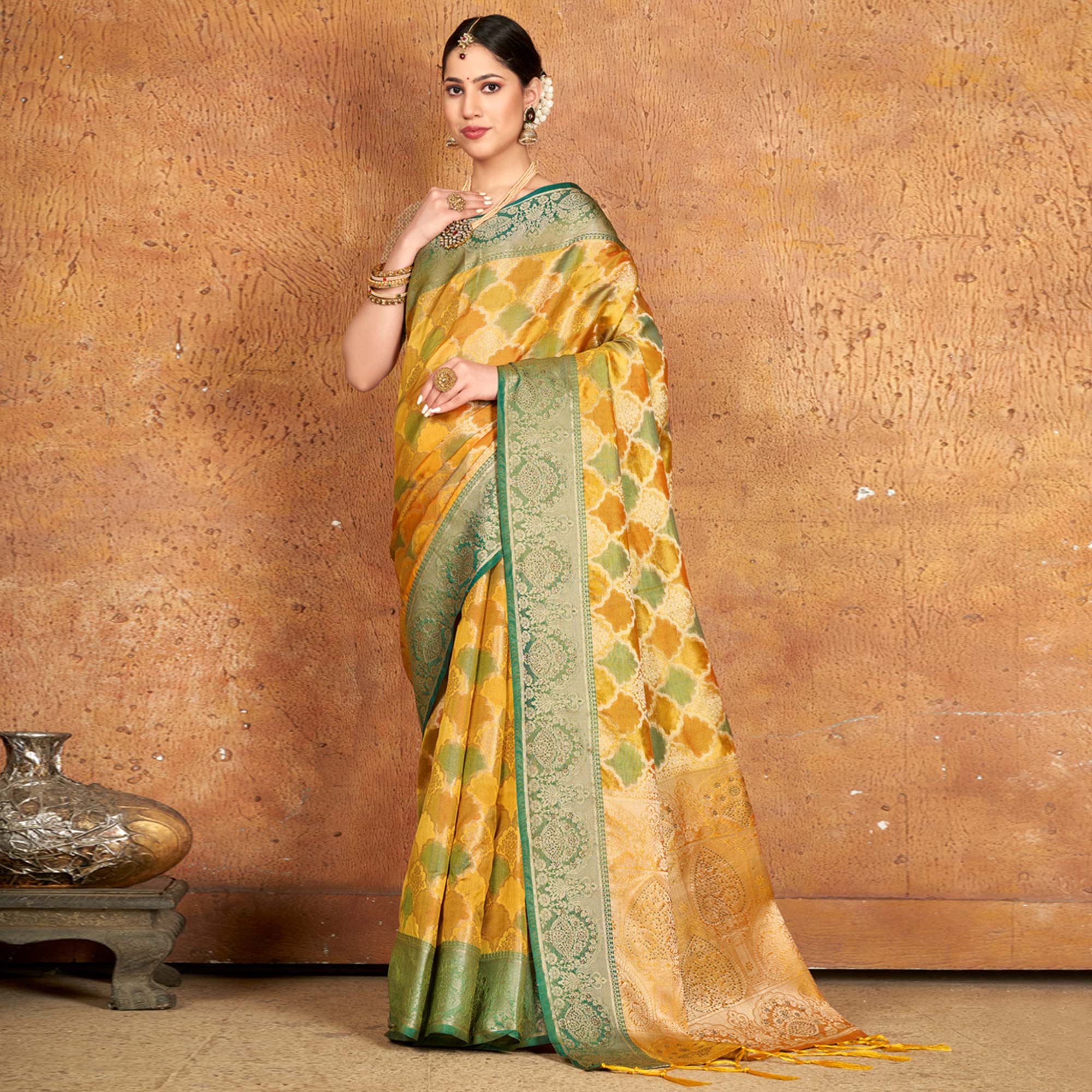 Yellow Woven Organza Saree With Tassels