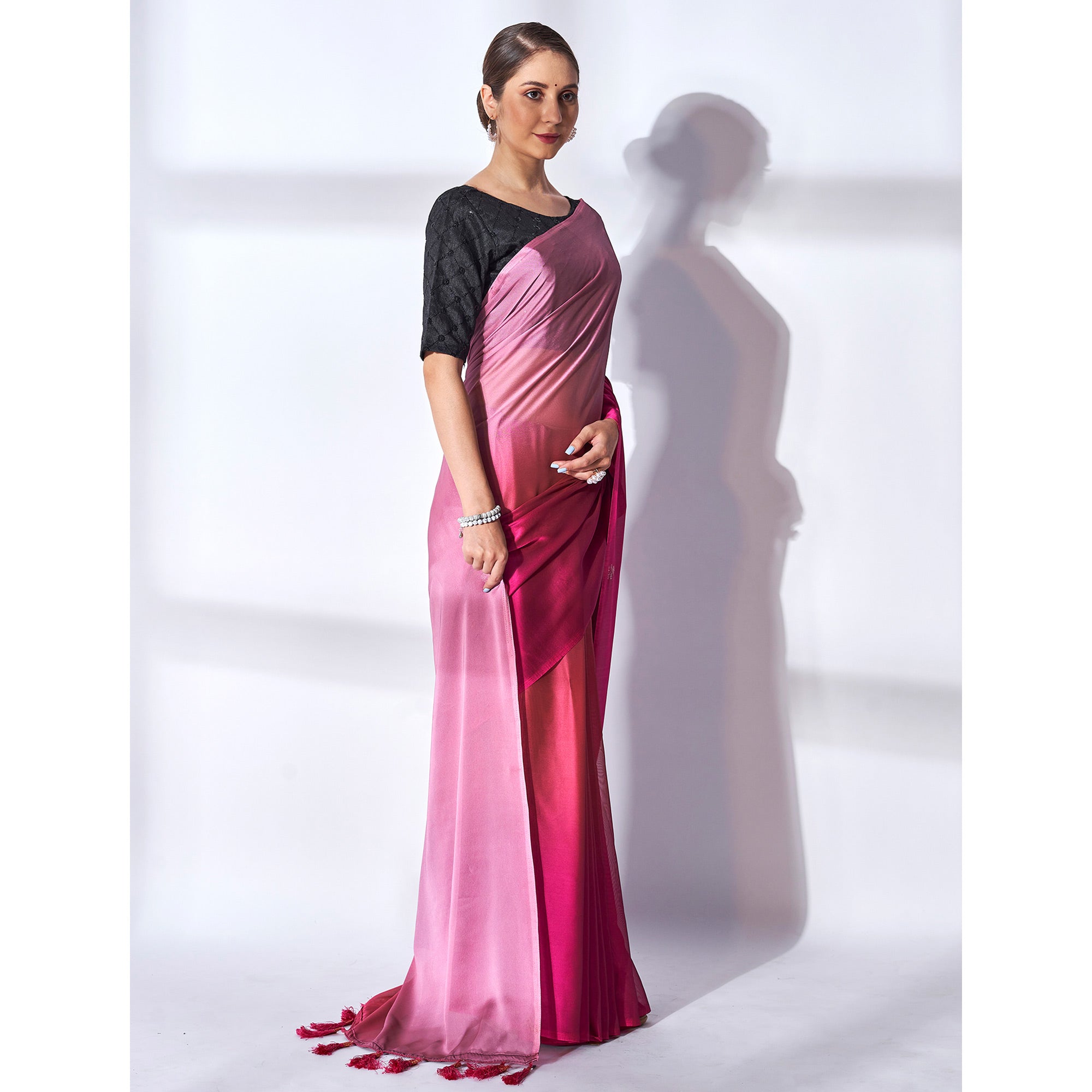 Pink Solid Georgette Saree With Tassels