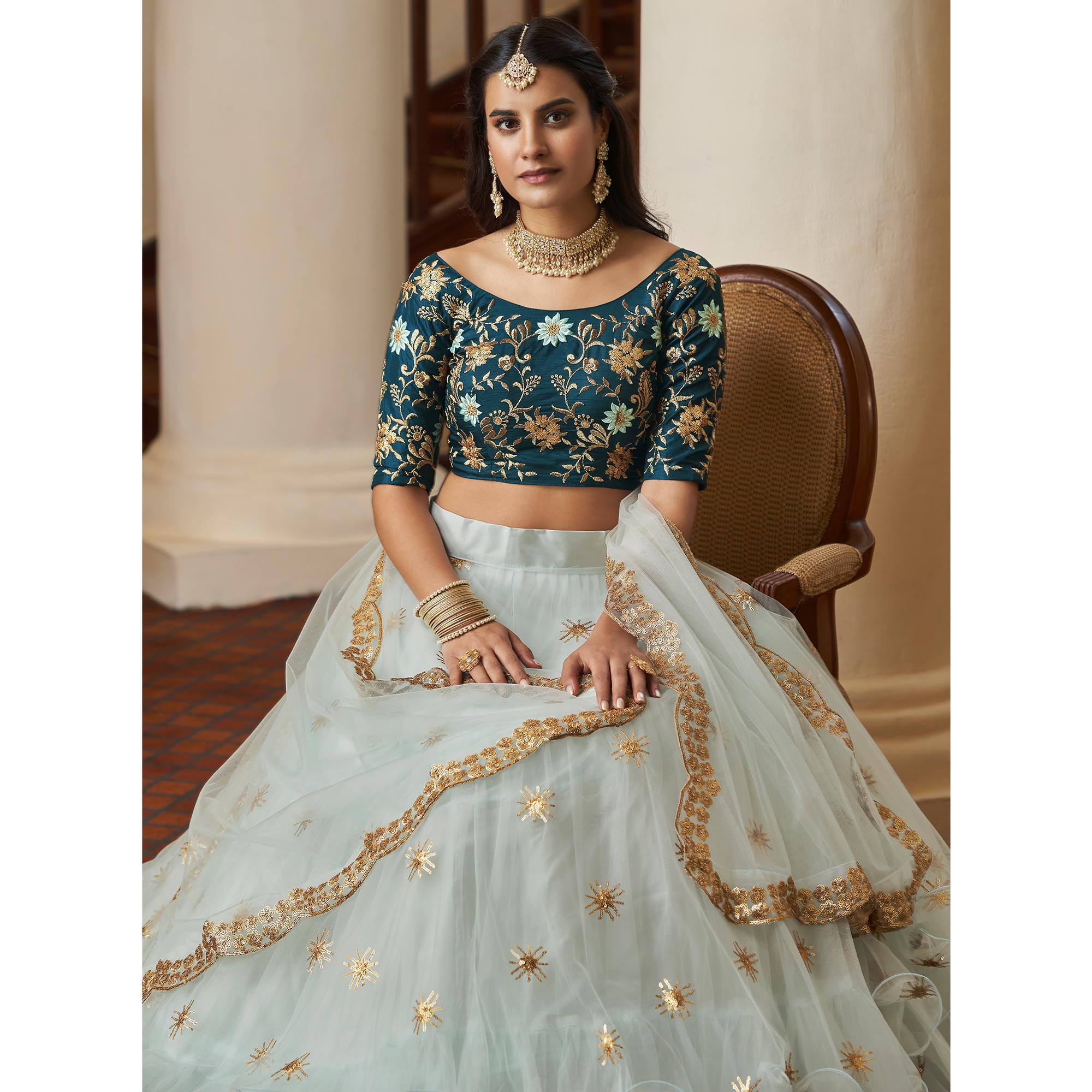 Sky Blue Sequins Embroidered Netted Lehenga Choli