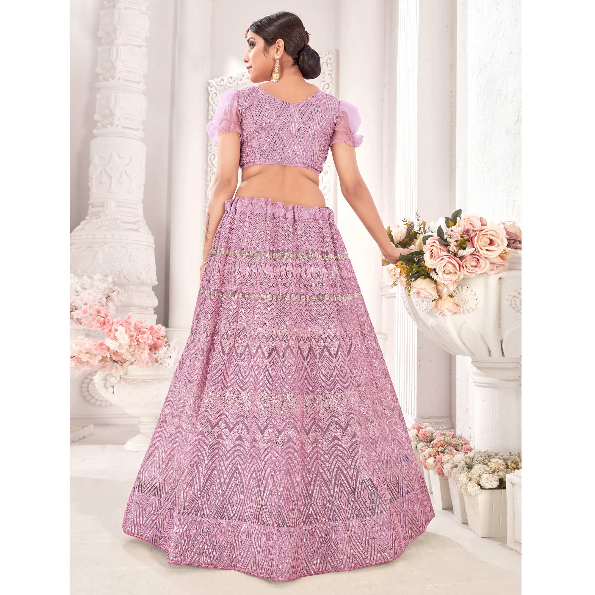 Mauve Sequins Embroidered Netted Lehenga Choli