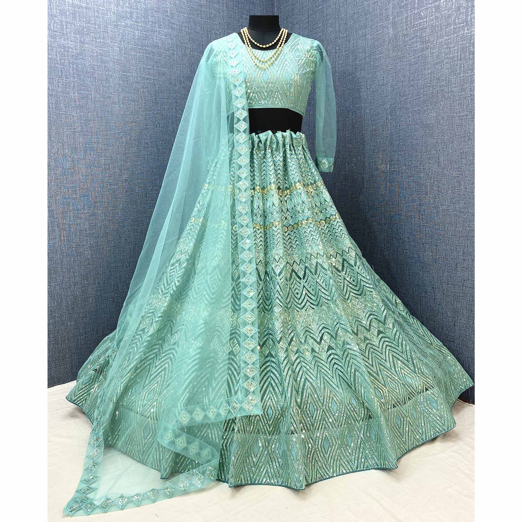 Sea Green Sequins Embroidered Netted Lehenga Choli