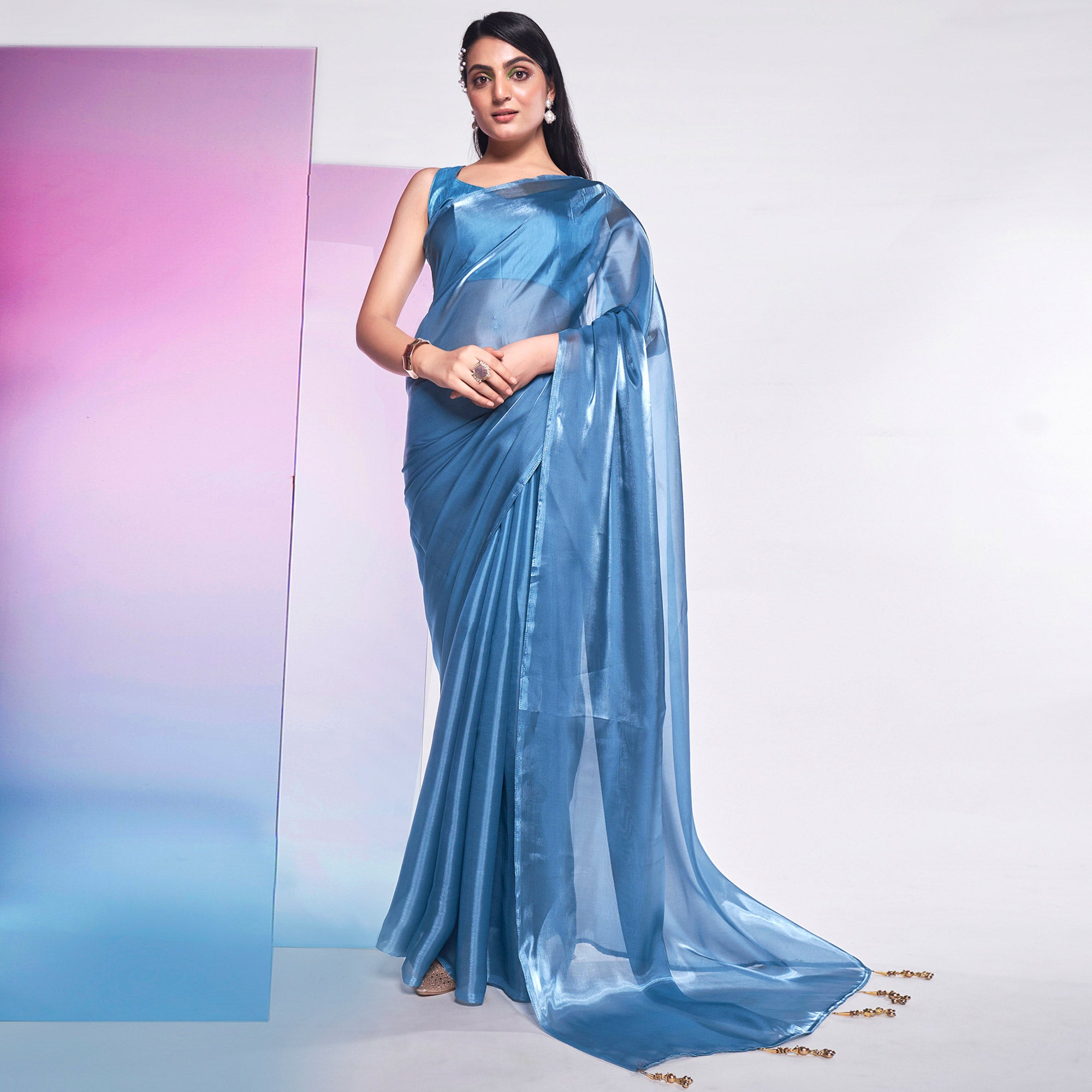 Sea Blue Solid Organza Saree With Tassels