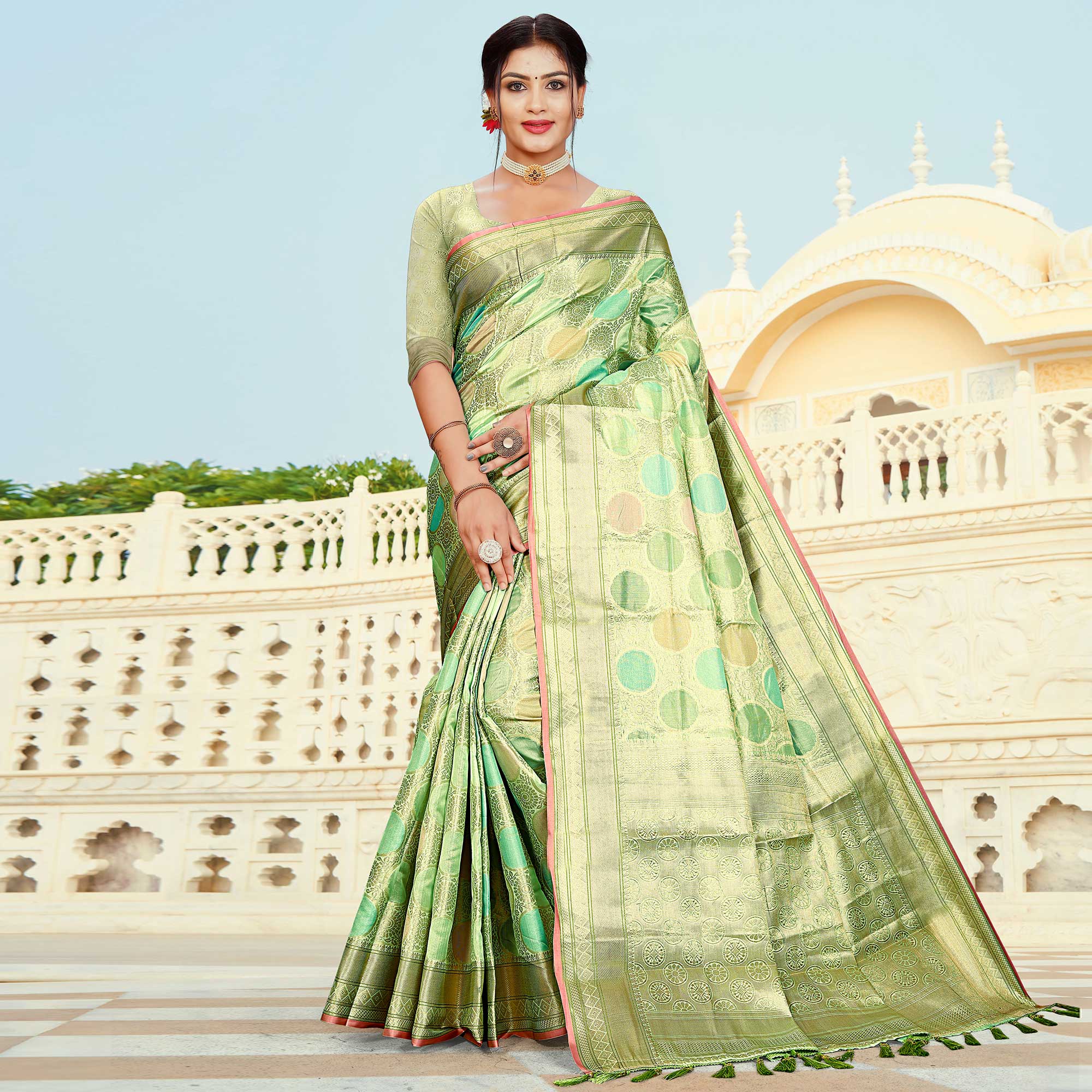 Pista Green Floral Woven Organza Saree With Tassels