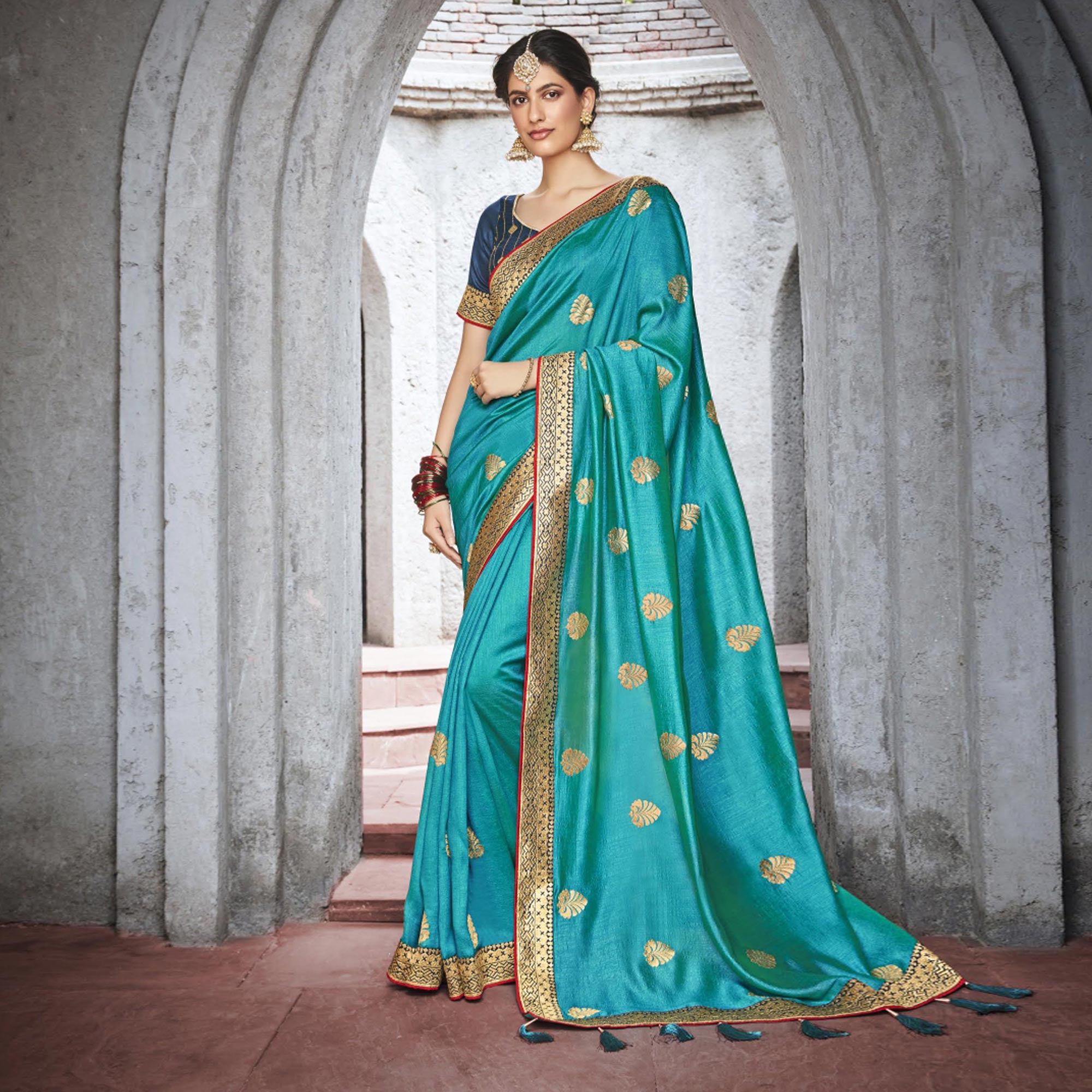 Rama Blue Woven Vichitra Silk Saree With Tassels