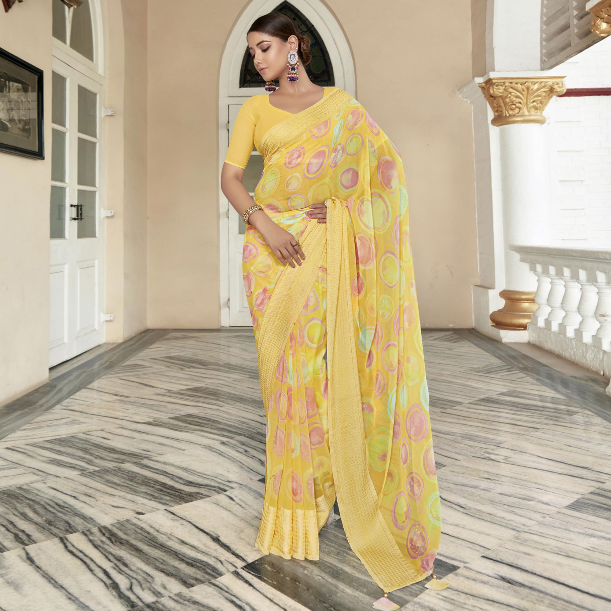 Yellow Printed Georgette Saree With Checks Border