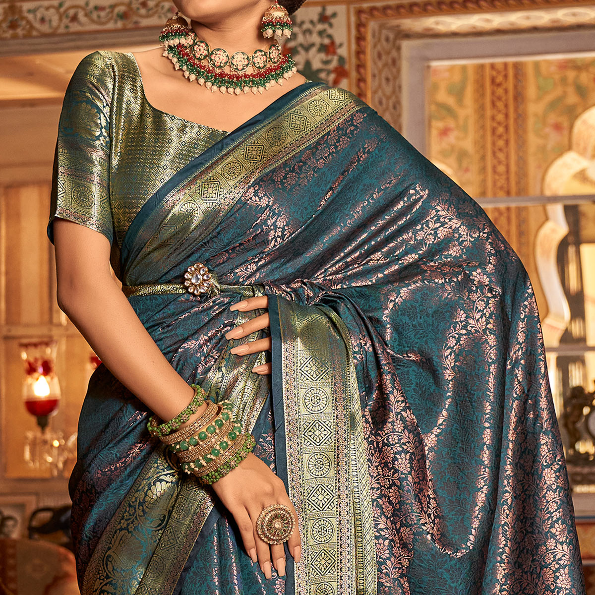 Teal Blue Floral Woven Kanjivaram Silk Saree