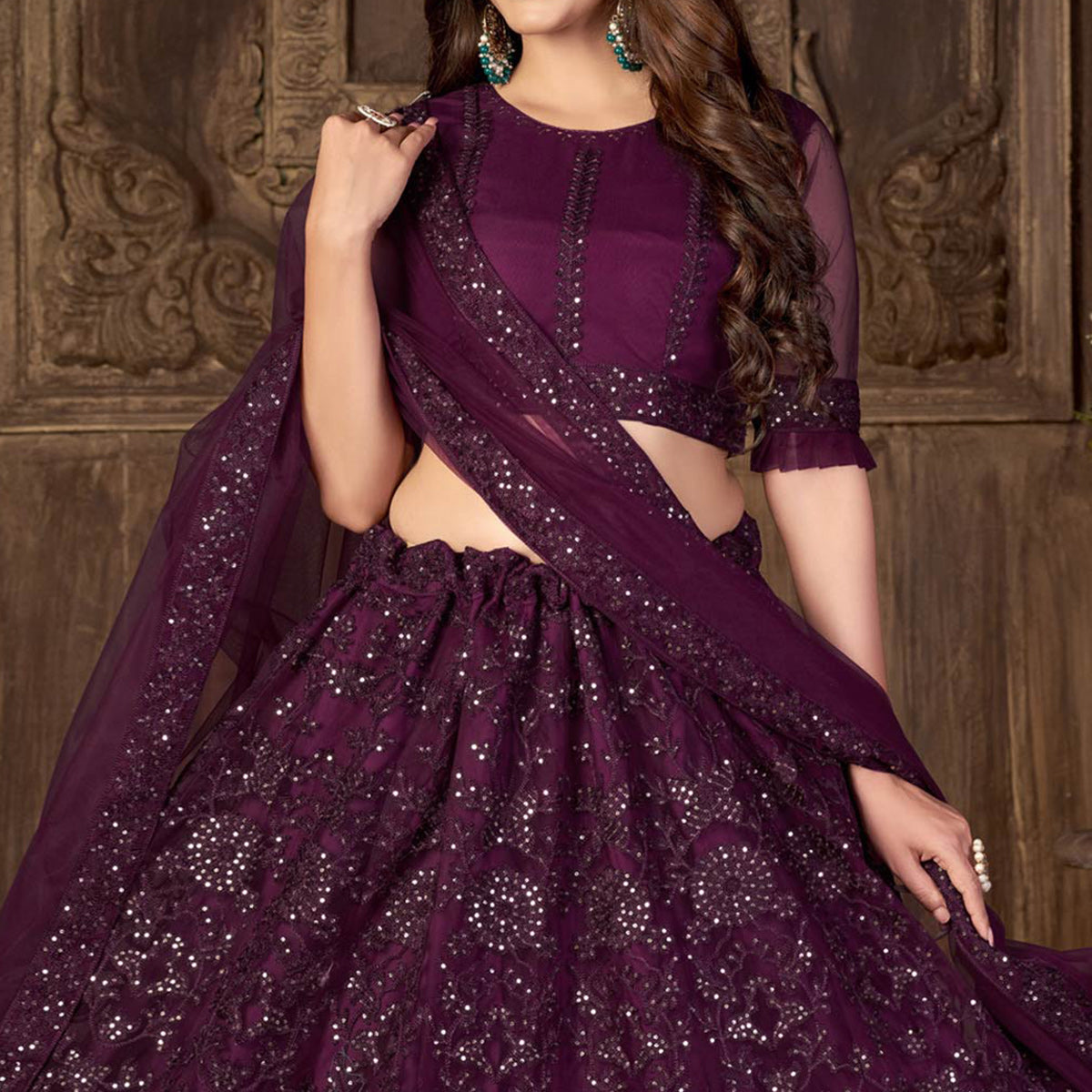 Wine Sequins Embroidered Netted Lehenga Choli