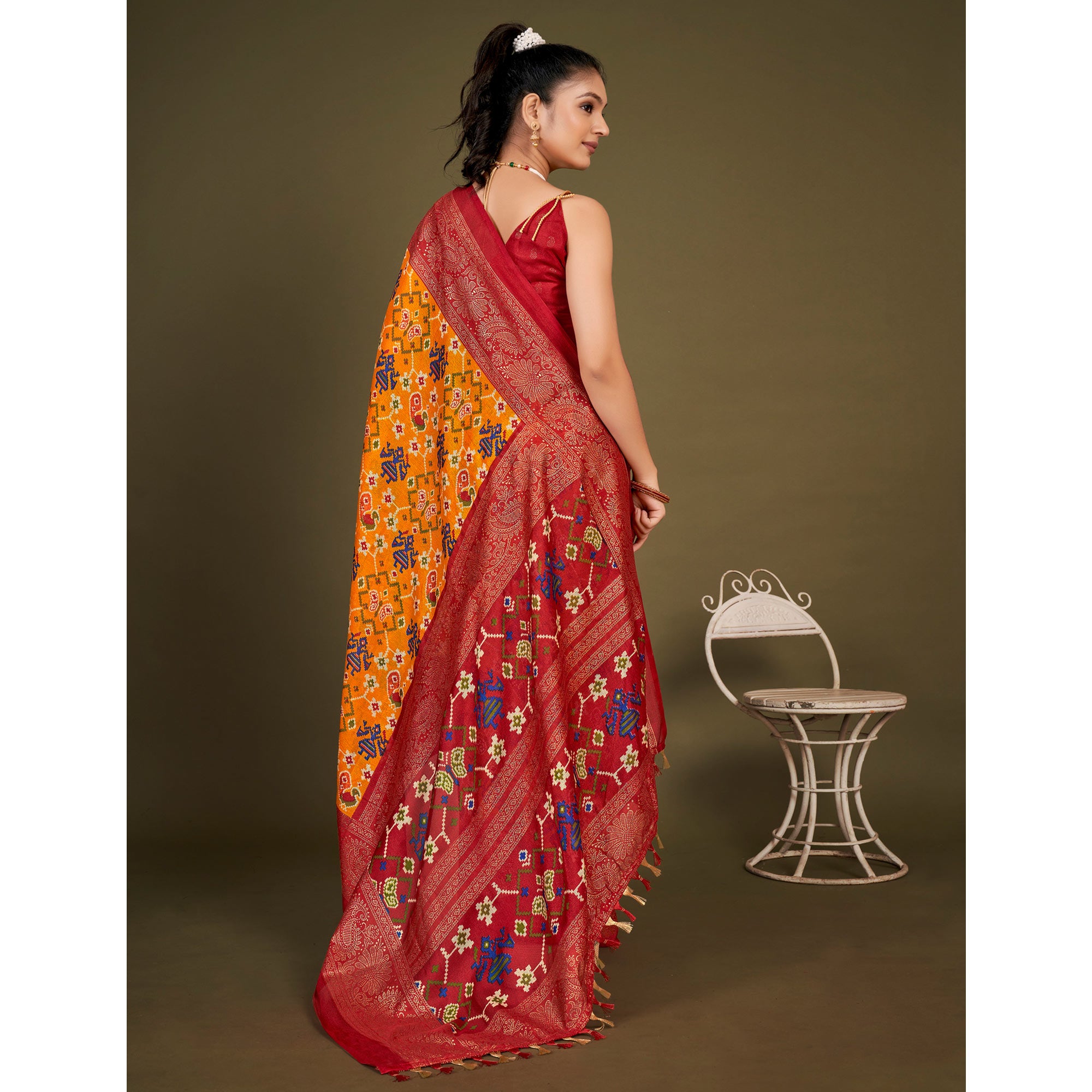 Mustard Printed Jute Patola Saree With Tassels