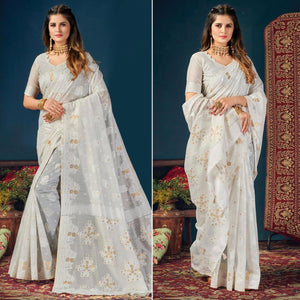 White Woven Cotton Blend Saree With Tassels