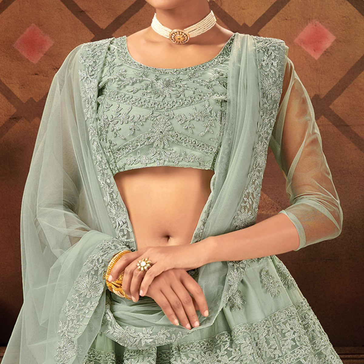 Green Embroidered Netted Lehenga Choli