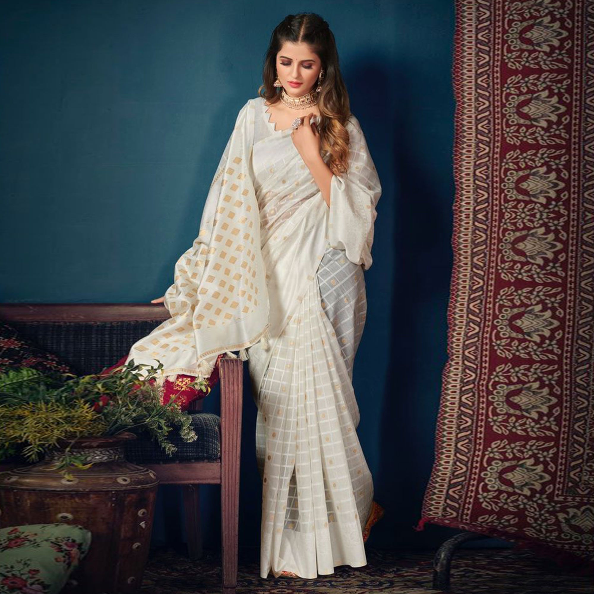 White Woven Cotton Blend Saree With Tassels