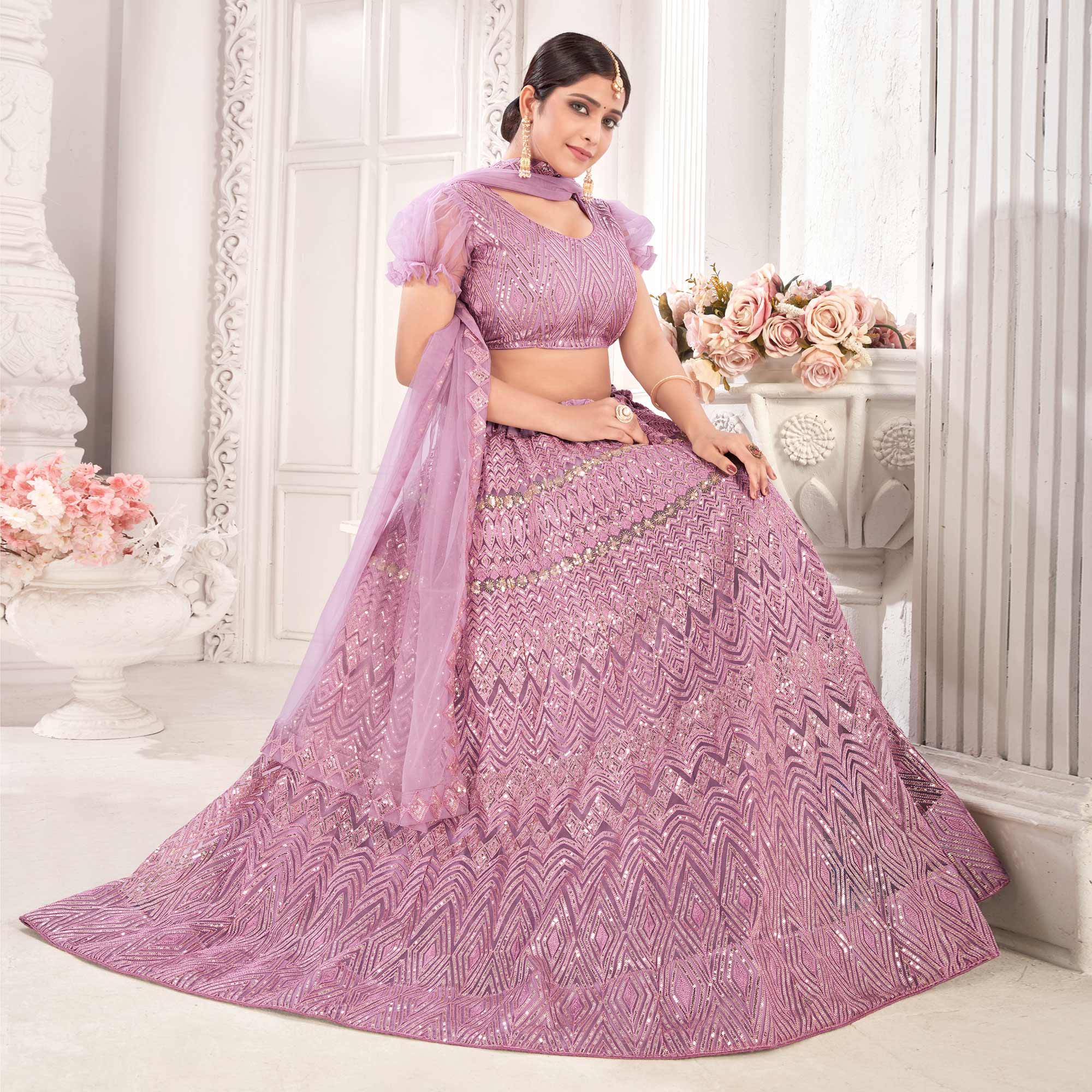 Mauve Sequins Embroidered Netted Lehenga Choli