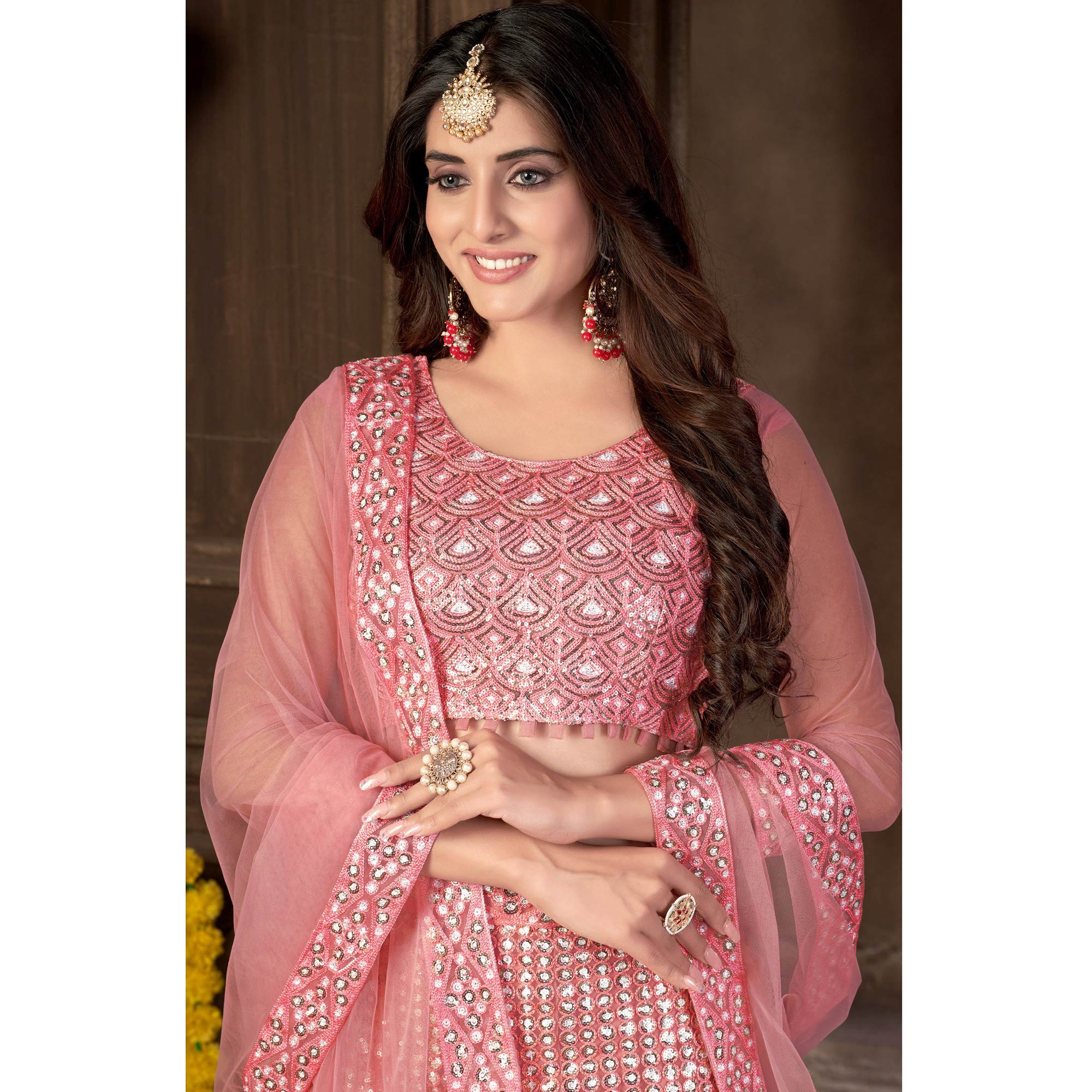 Pink Sequins Embroidered Netted Lehenga Choli