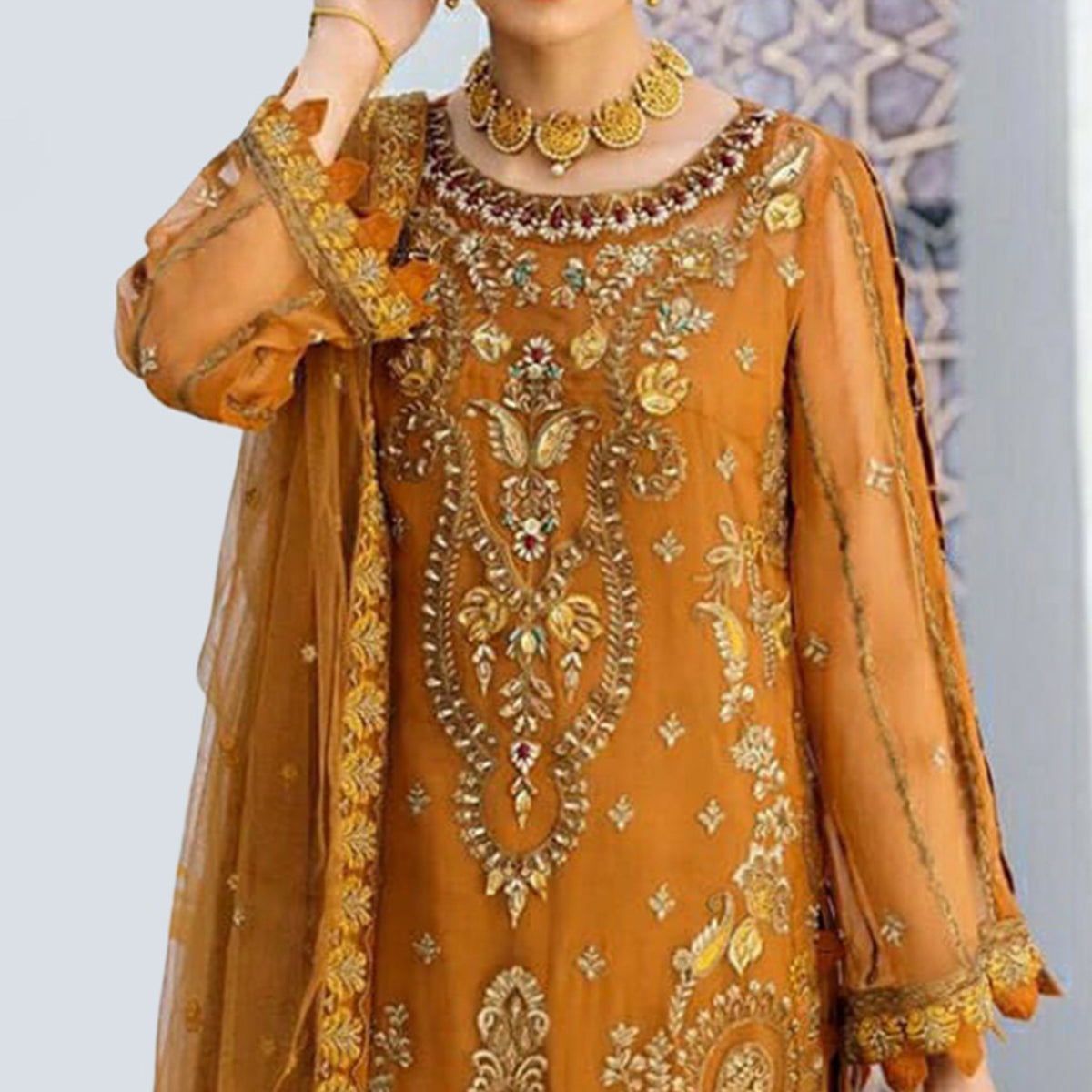 Mustard Heavy Embroidered Georgette Pakistani Suit