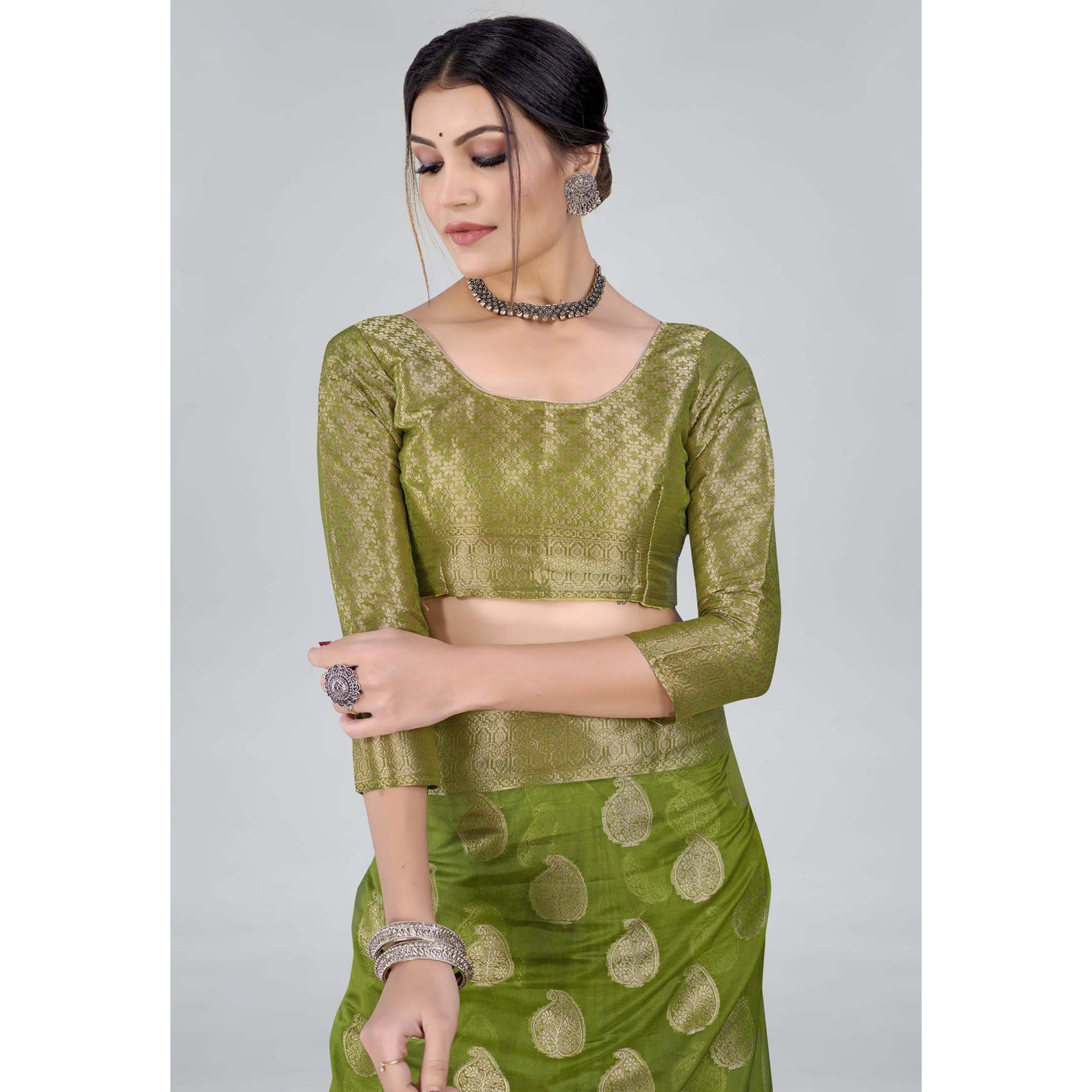 Green Woven Organza Saree With Tassels