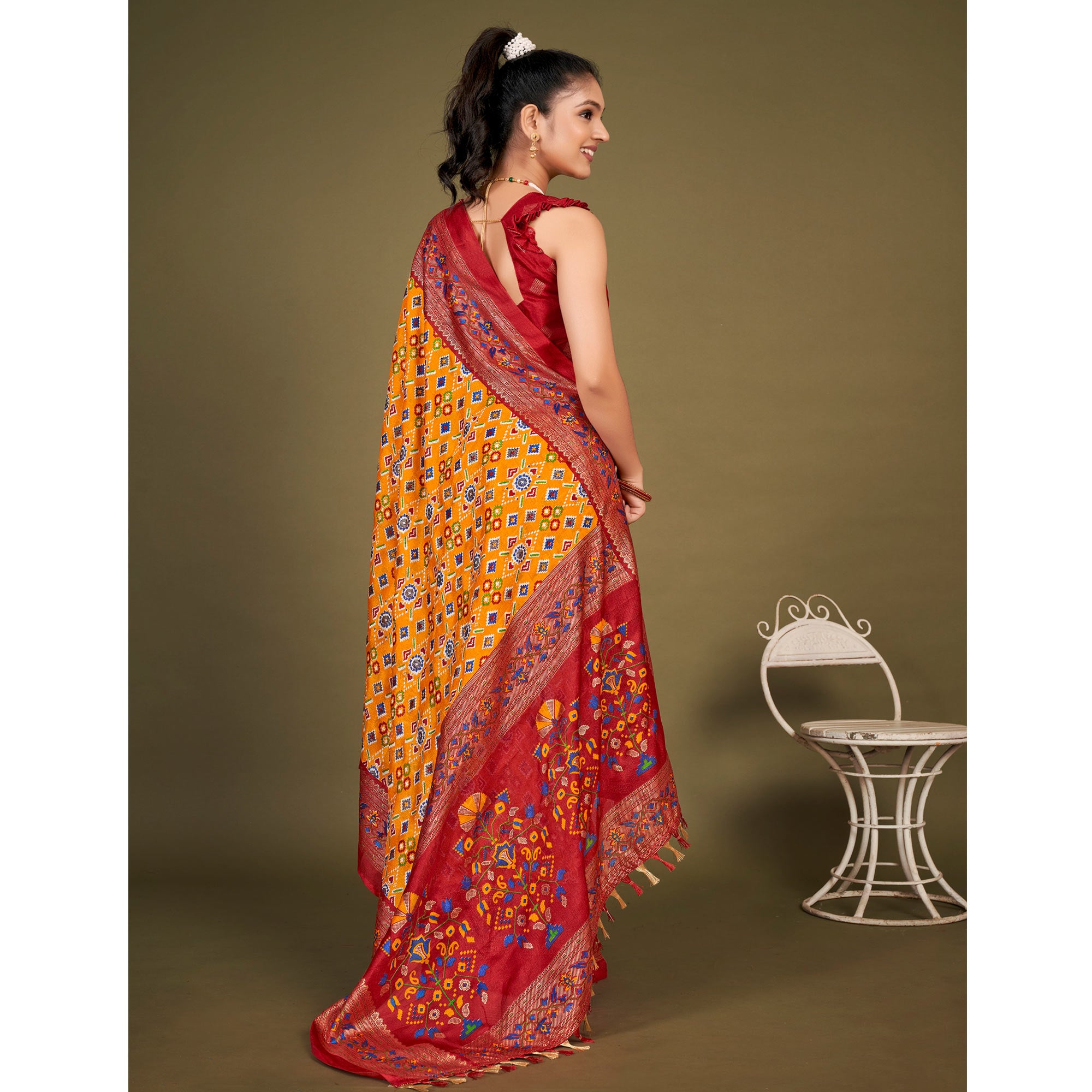 Yellow Printed Jute Patola Saree With Tassels