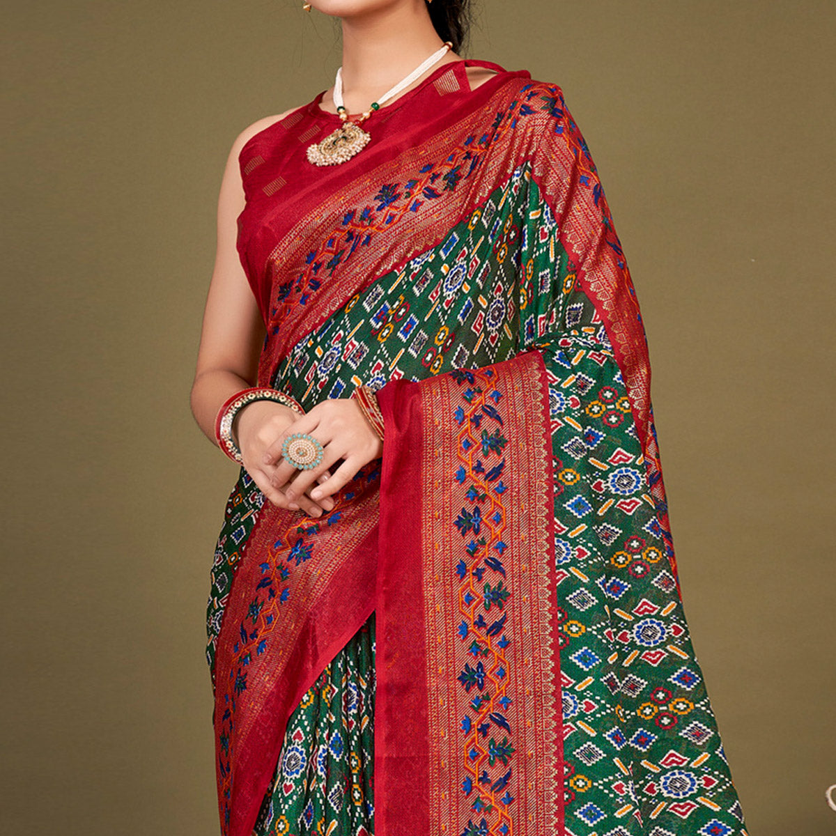 Green Printed Jute Patola Saree With Tassels