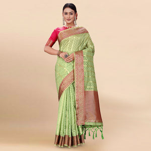 Green Woven Organza Saree With Tassels