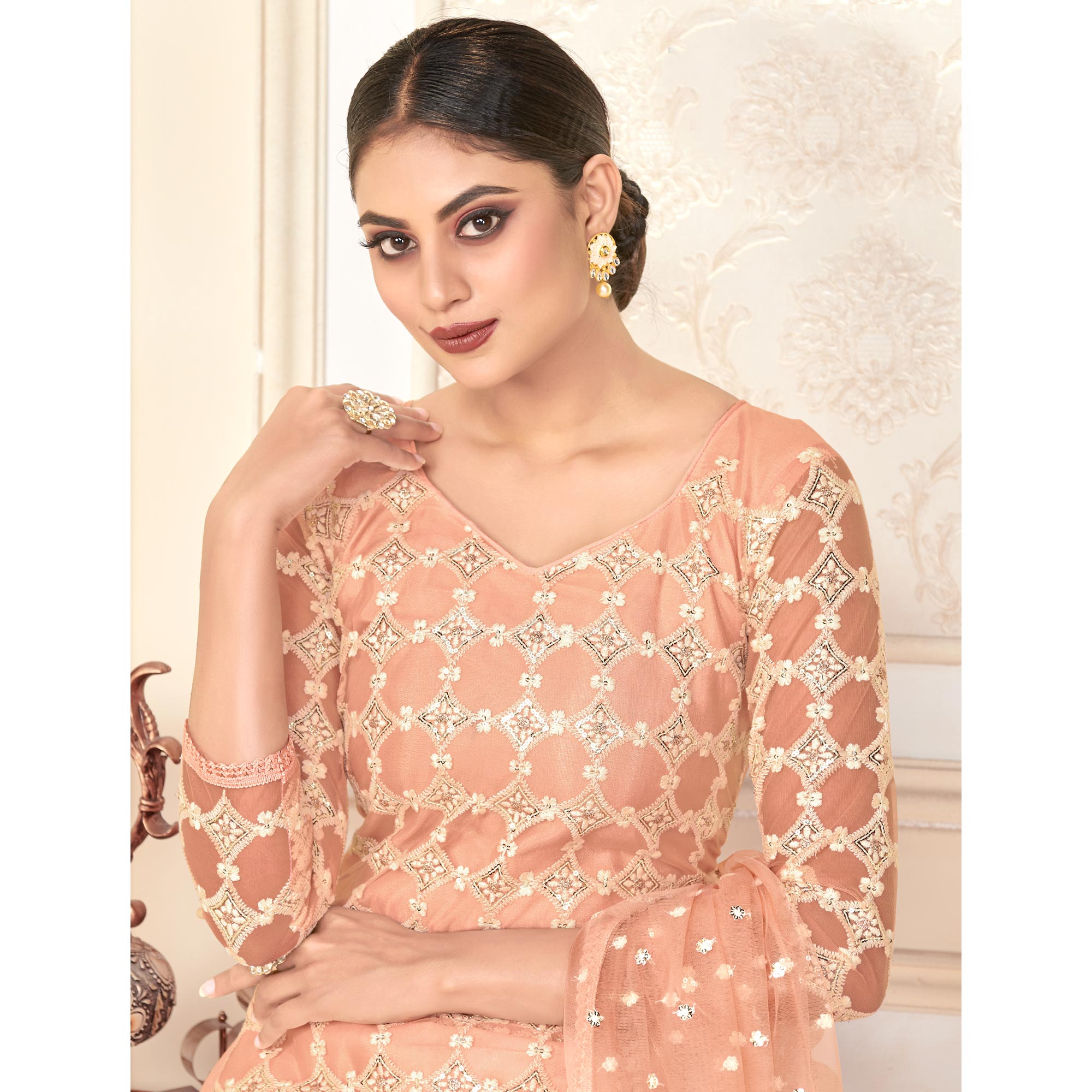 Peach Sequins Embroidered Net Semi Stitched Suit