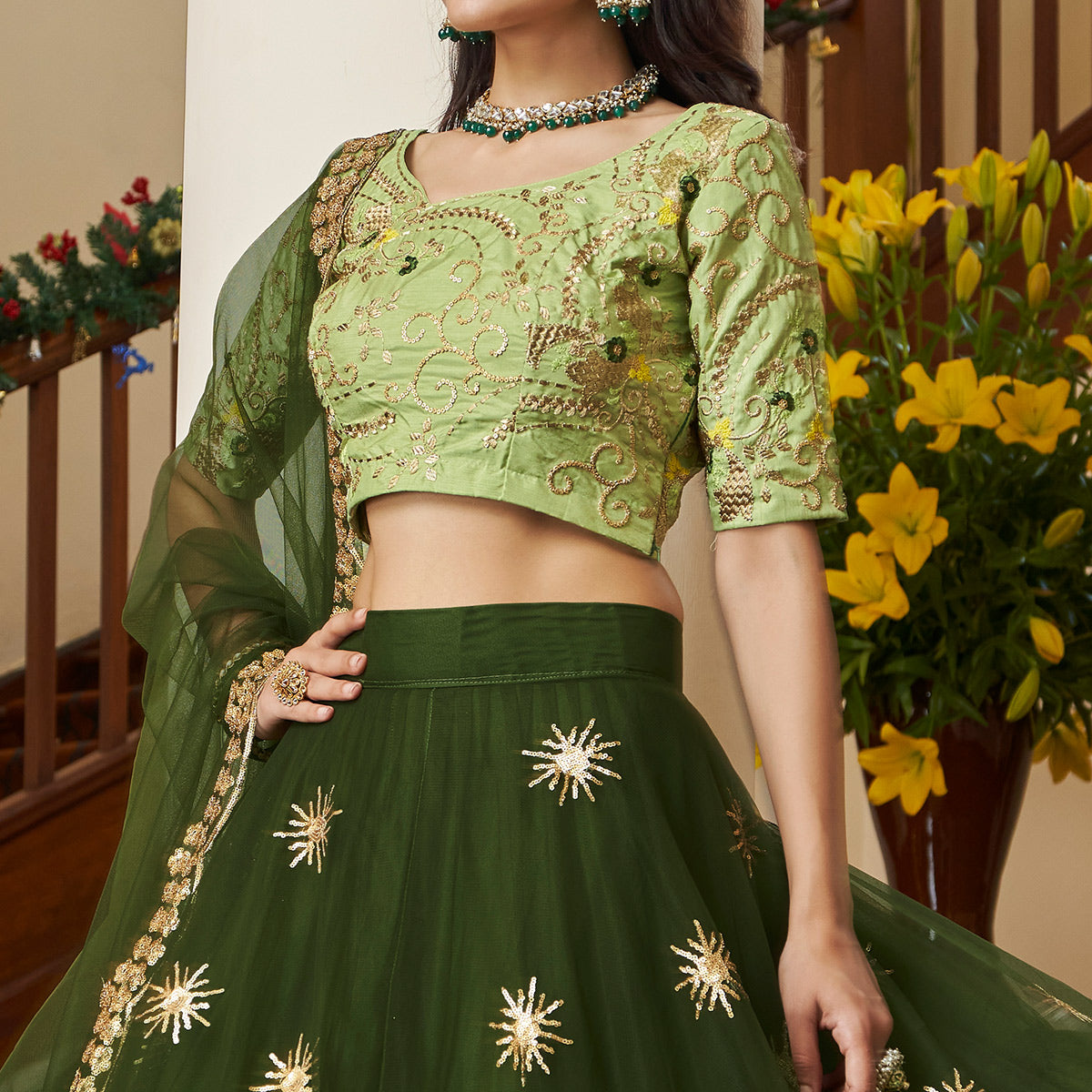 Mehendi Green Sequins Embroidered Netted Lehenga Choli