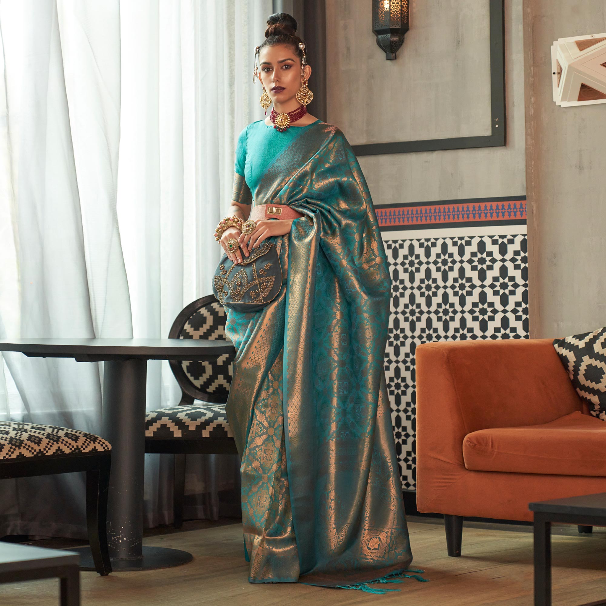 Turquoise Woven Art Silk Saree With Tassels