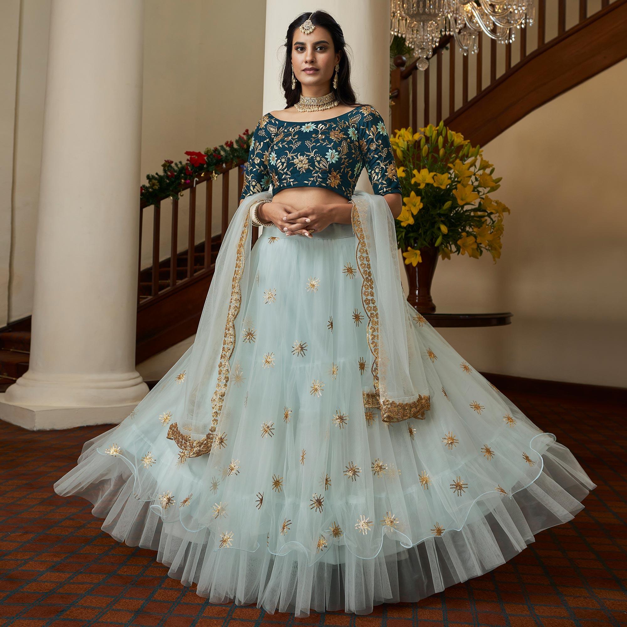 Sky Blue Sequins Embroidered Netted Lehenga Choli