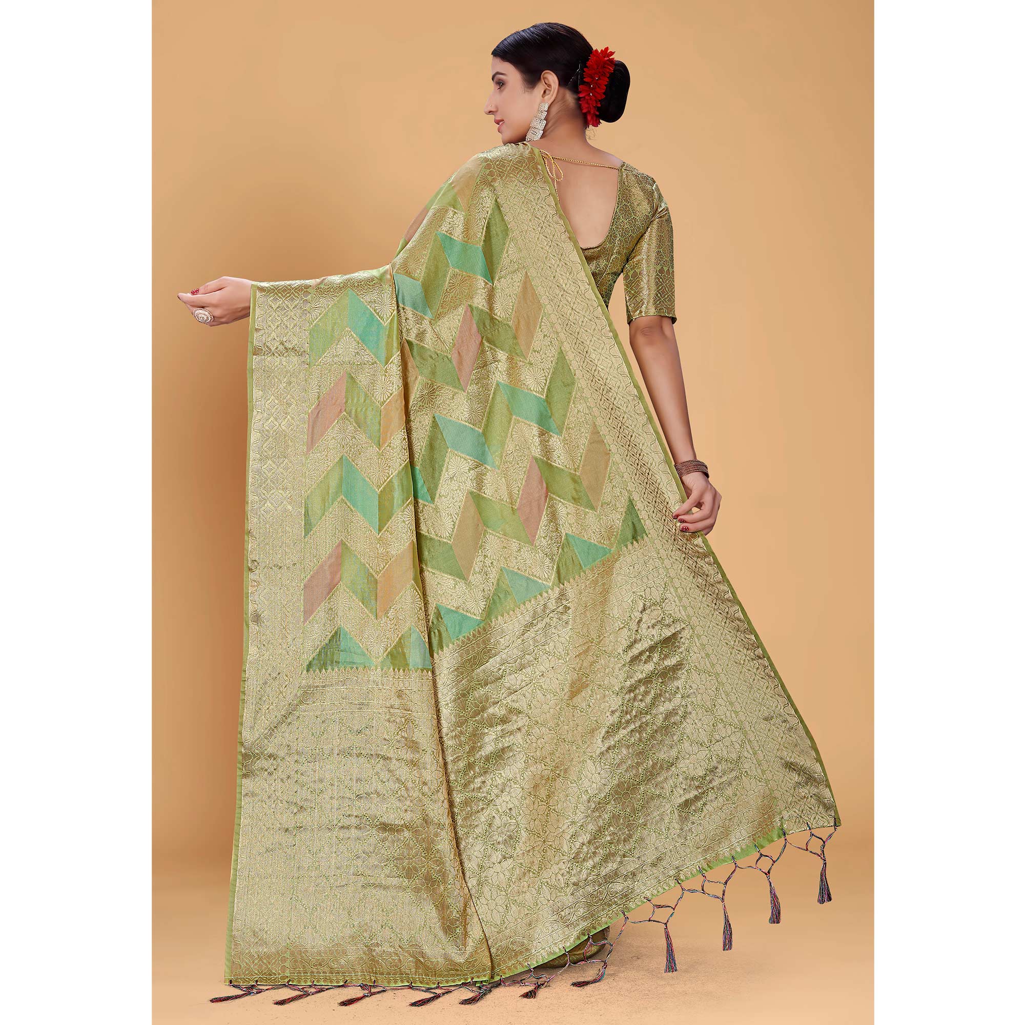 Green Woven Organza Saree With Tassels