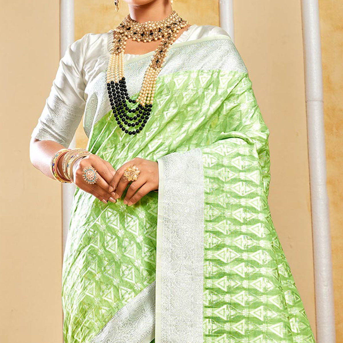 Pista Green Woven Cotton Silk Saree With Tassels
