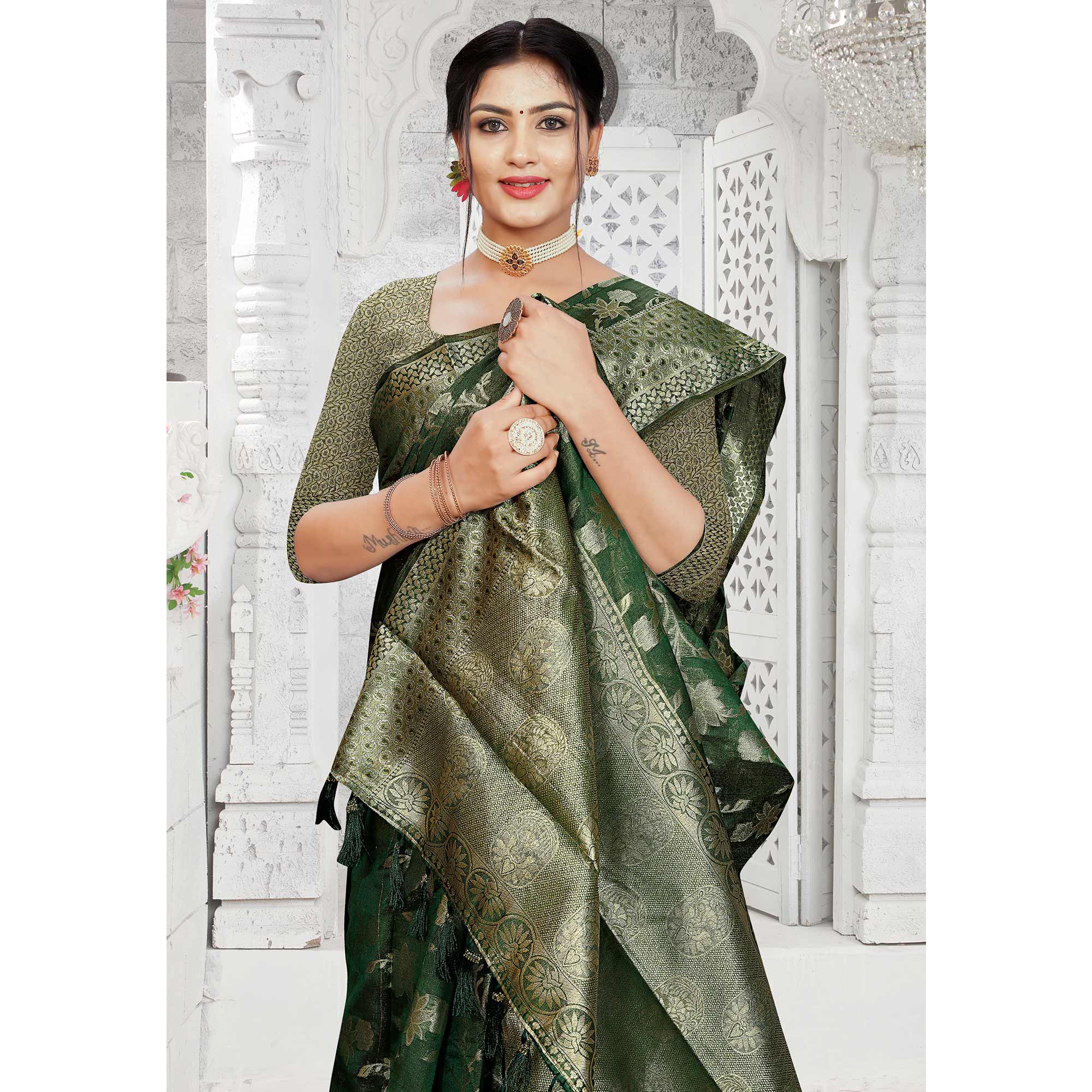 Bottle Green Floral Woven Organza Saree With Tassels